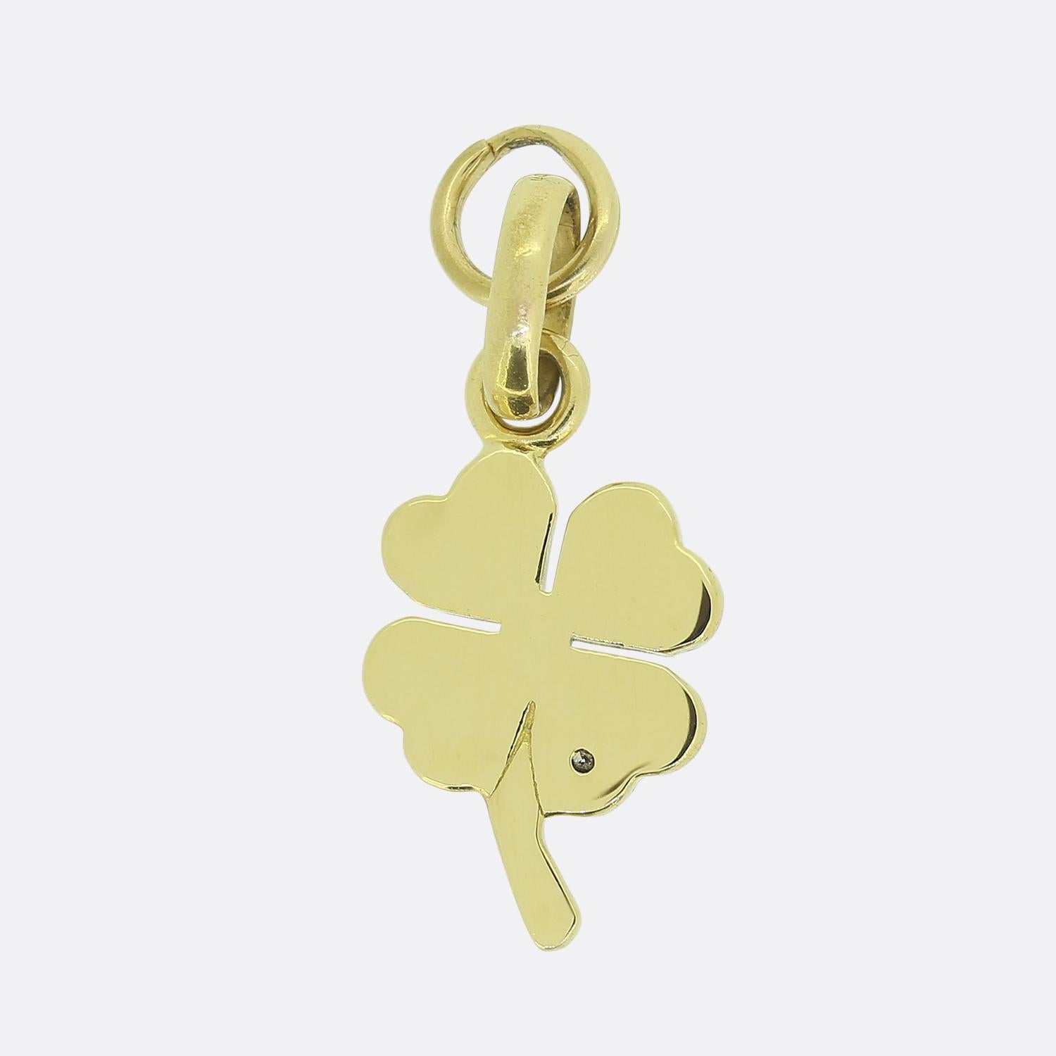 Here we have an 18ct yellow gold charm from the world-renowned (now retired) British jewellery designer, Links of London. This particular piece has been crafted into the shape of a four leafed clover complete with stem and a single round brilliant