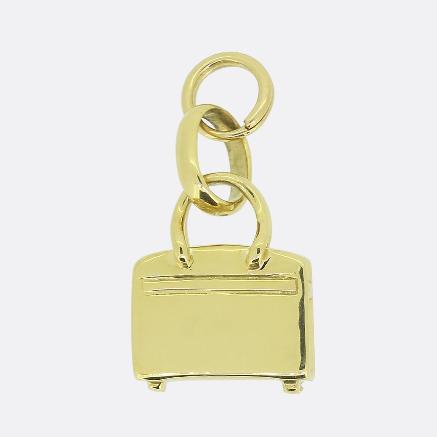 Here we have an 18ct yellow gold charm from the world-renowned (now retired) British jewellery designer, Links of London. This particular piece has been crafted into the shape of a double handled holdall travel bag making it the perfect gift to any