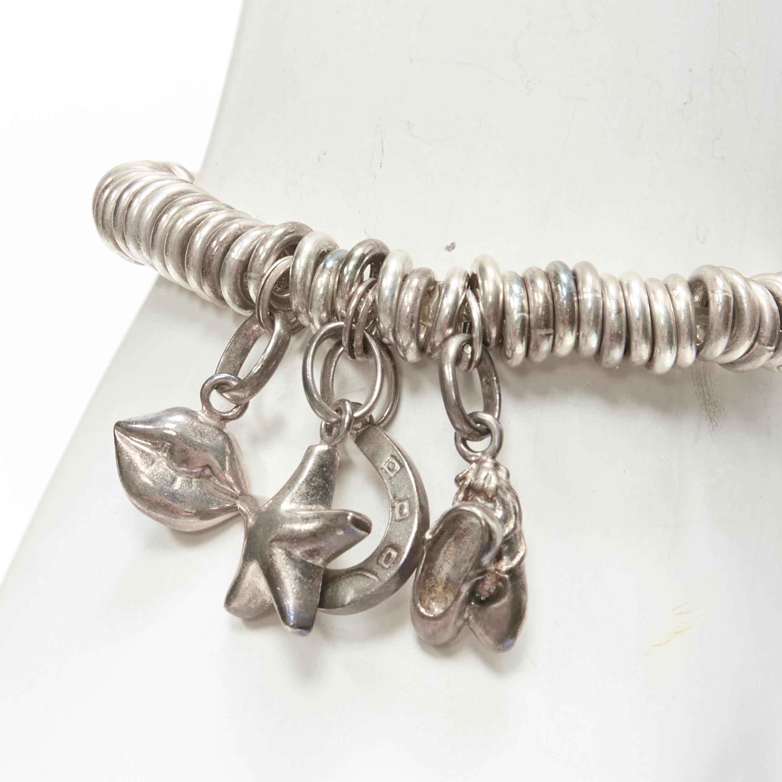 LINKS OF LONDON sterling silver star horsebit lips ballet charm bracelet
Reference: ANWU/A00282
Brand: Links of London
Material: Silver
Color: Silver
Pattern: Solid
Closure: Elasticated

CONDITION:
Condition: Good, this item was pre-owned and is in