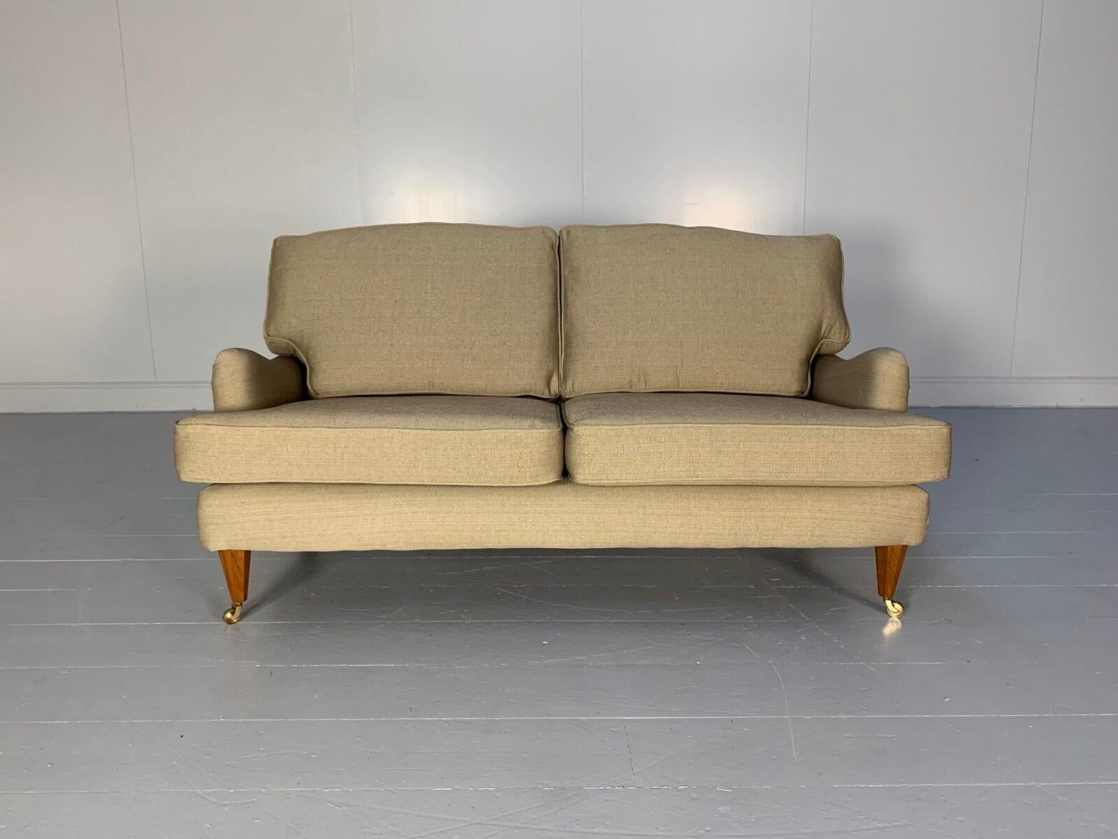 On offer on this occasion is a peerless Linley 2.5-seat Howard-design sofa, dressed in a luxurious, top-grade pale-gold woven-fabric, and with hexagonal carved-walnut front-legs with brass-castors.

As you will no doubt be aware by your interest in