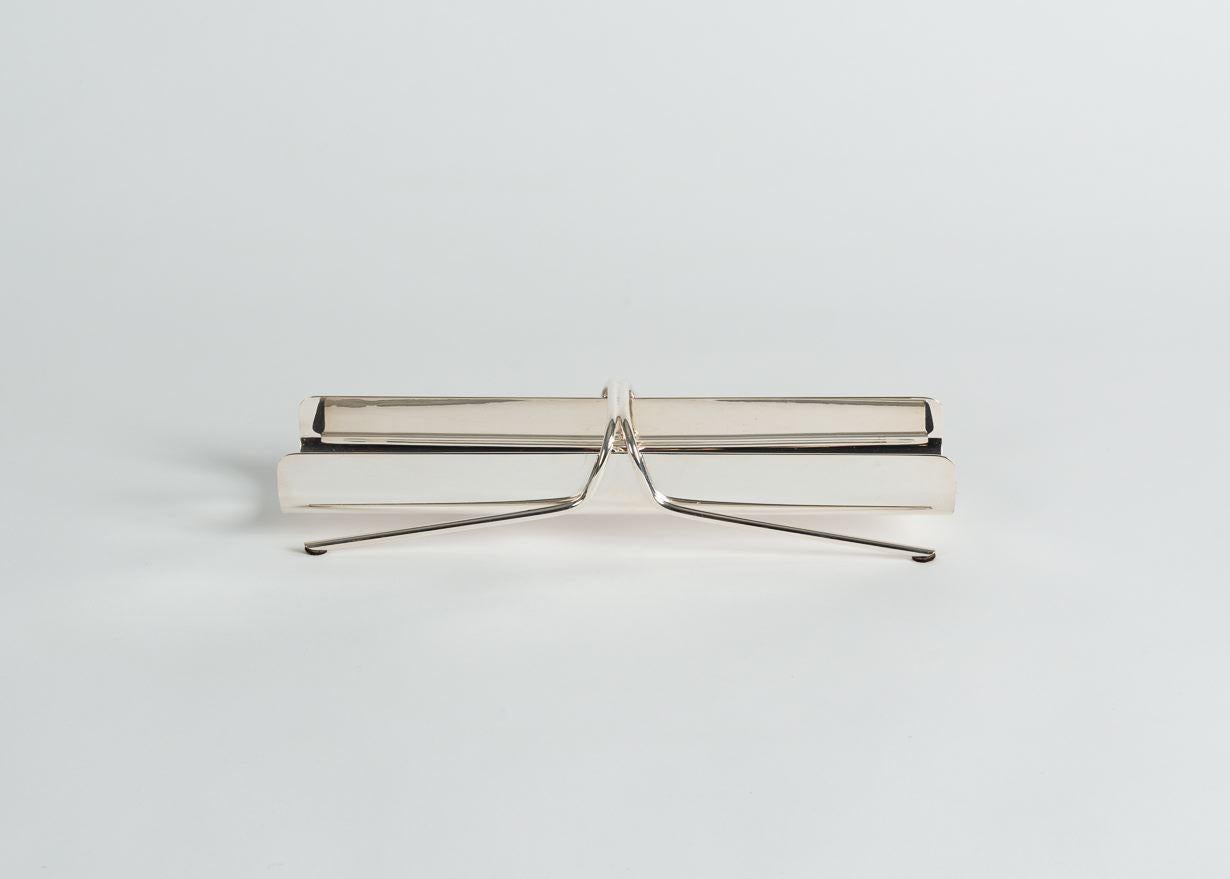 This sleek, midcentury tray was designed by Lino Sabattini and made of silvered metal for Christofle.