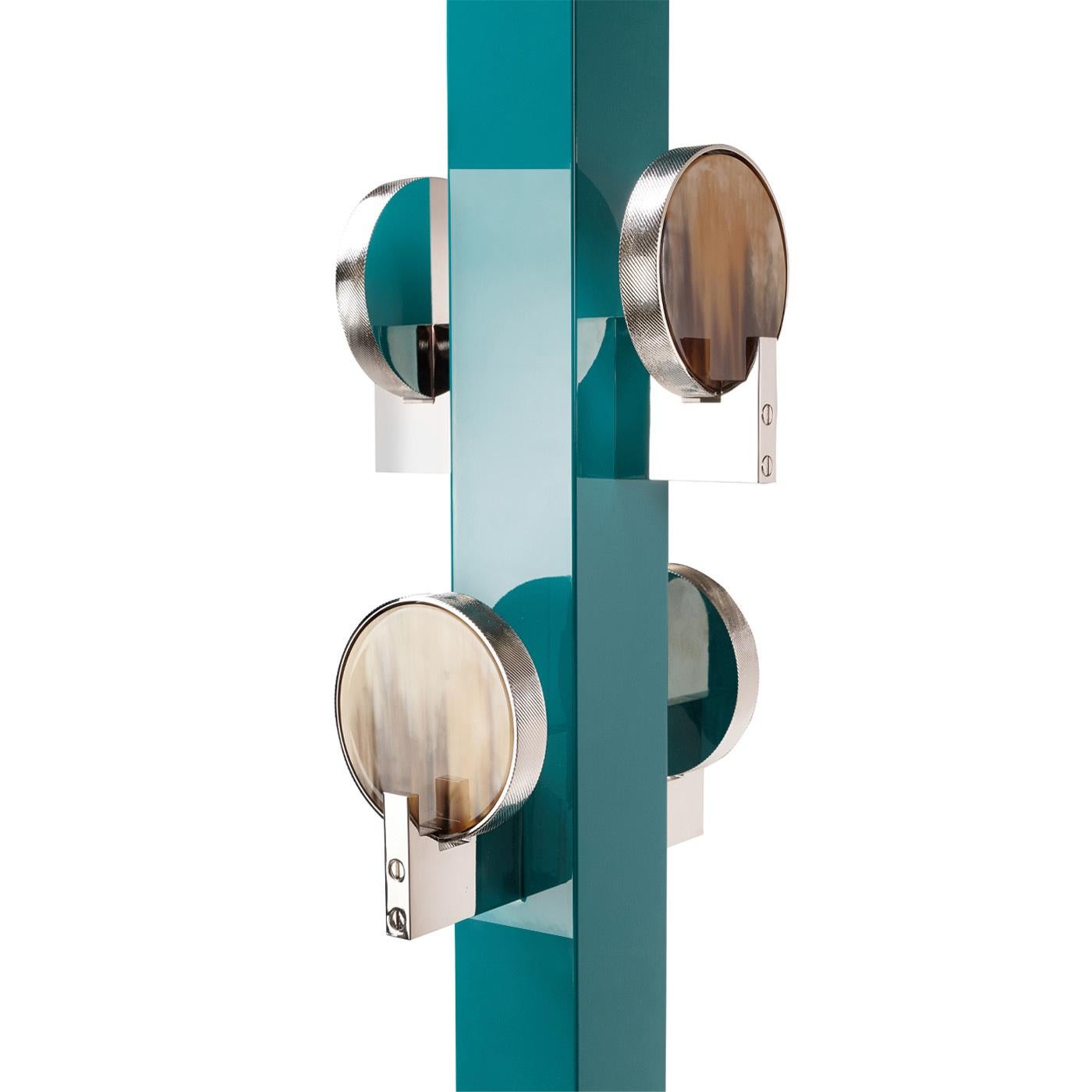 Stylish yet fuctional, our Linosa coat stand is a desirable element for the entryway or corridor. The wooden structure is proposed in a water blue colour lacquer and features five practical hooks that ensure large hanging space for your coats, bags