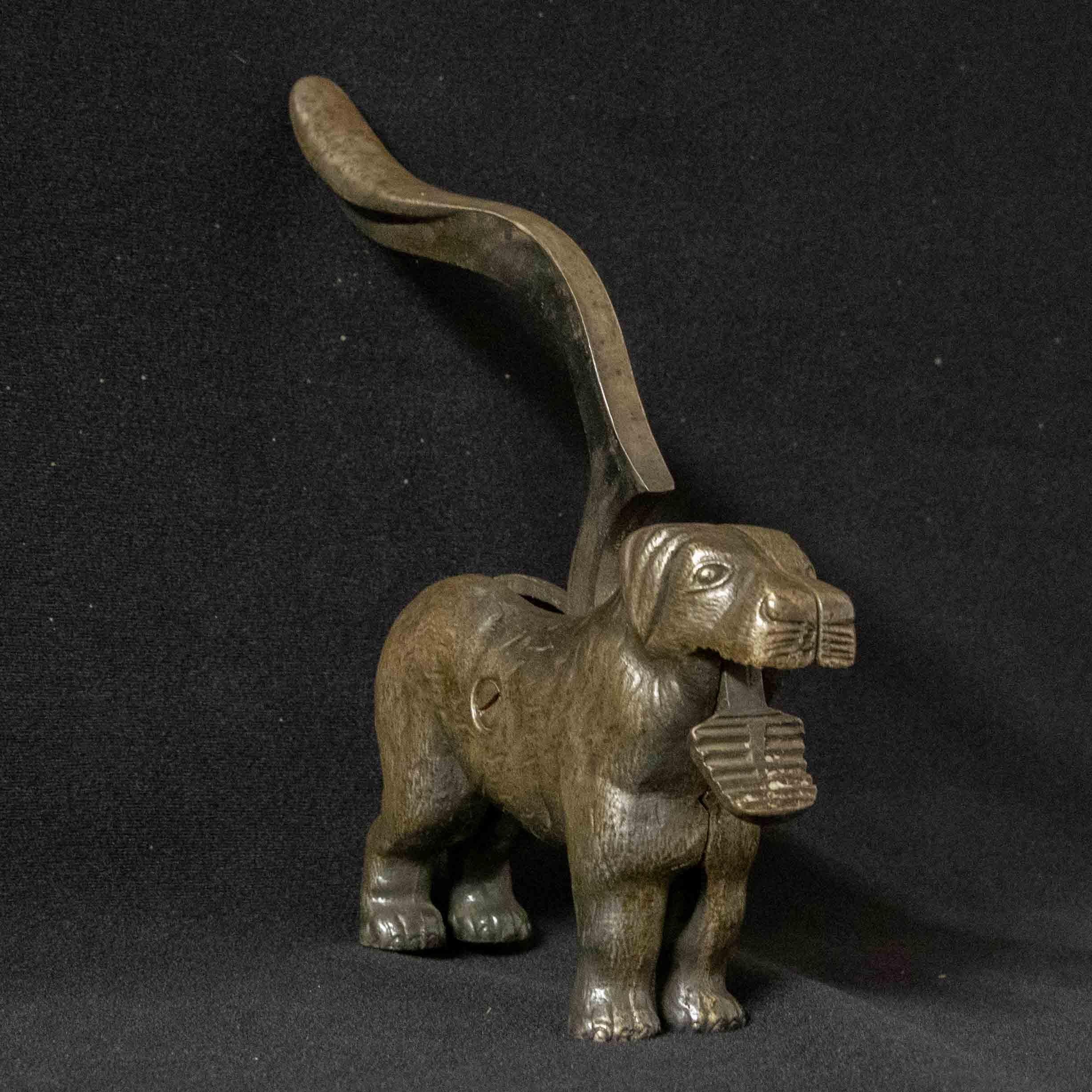 A rare find that is totally unused, this is a Linton dog nut cracker in the form of a dog and levered by its tail. Possibly a gift to someone in the 1930s and stored in a drawer ever since. It's a heavy substantial piece that feels weighty and will