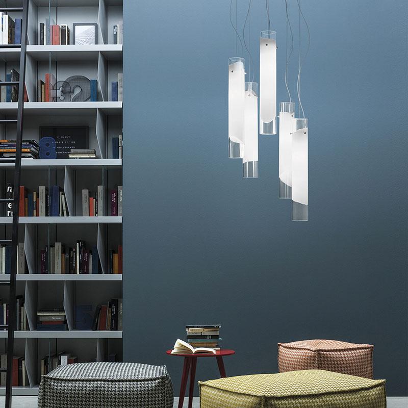 A comprehensive range of lamps that share a minimal, unobtrusive design that makes the most of the light source, which to the traslucid white band inserted in the glass.

Specifications: 
Light Source: E26
No of Bulbs: 5×60W E26
Dimmer: DIM