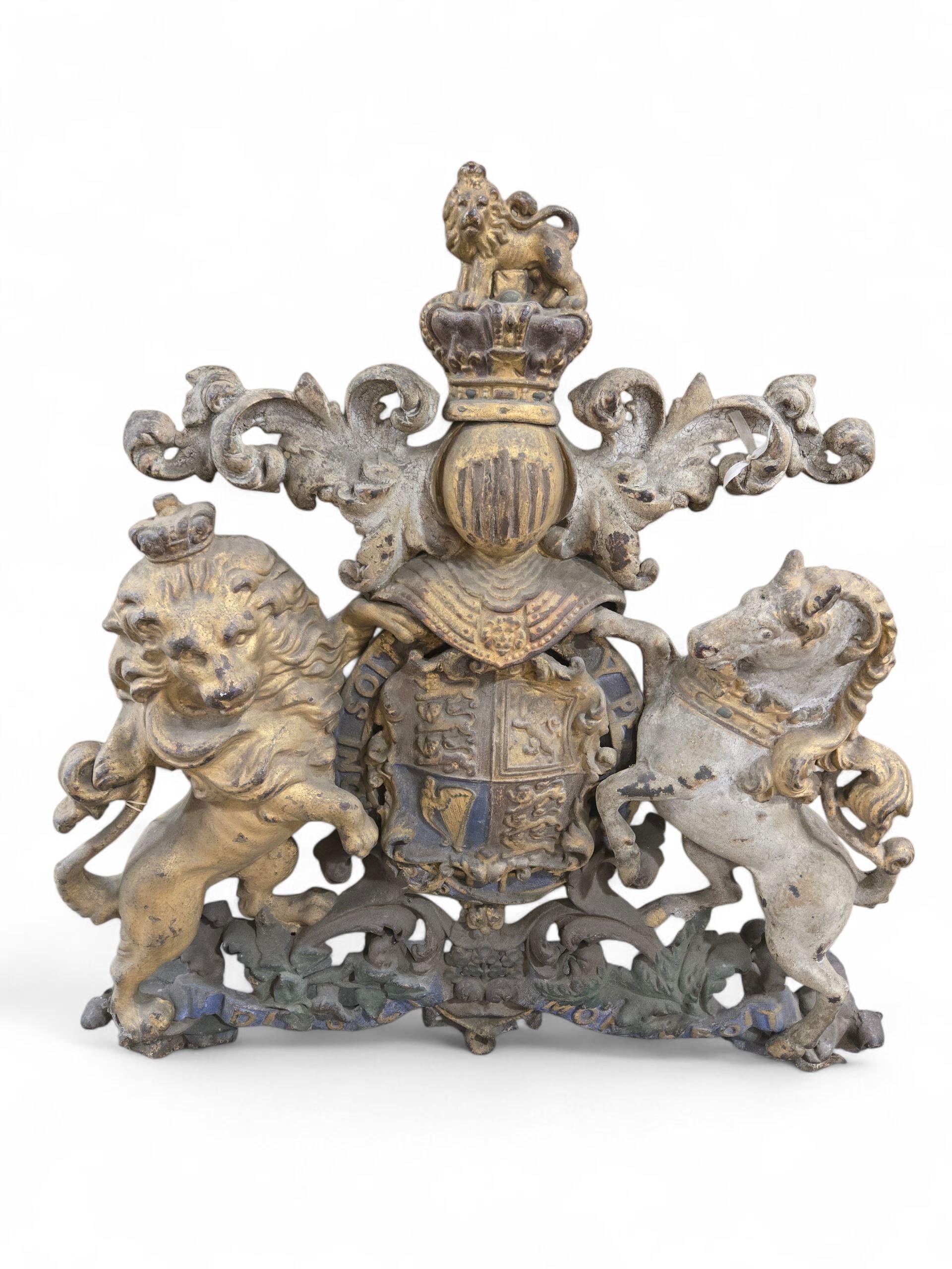 Antique 19th Century Cast Iron Armorial Plaque Featuring the Lion and Unicorn Coat of Arms
A striking and historically resonant 19th-century cast iron armorial plaque, boldly depicting the iconic British heraldic motif of the Lion and the