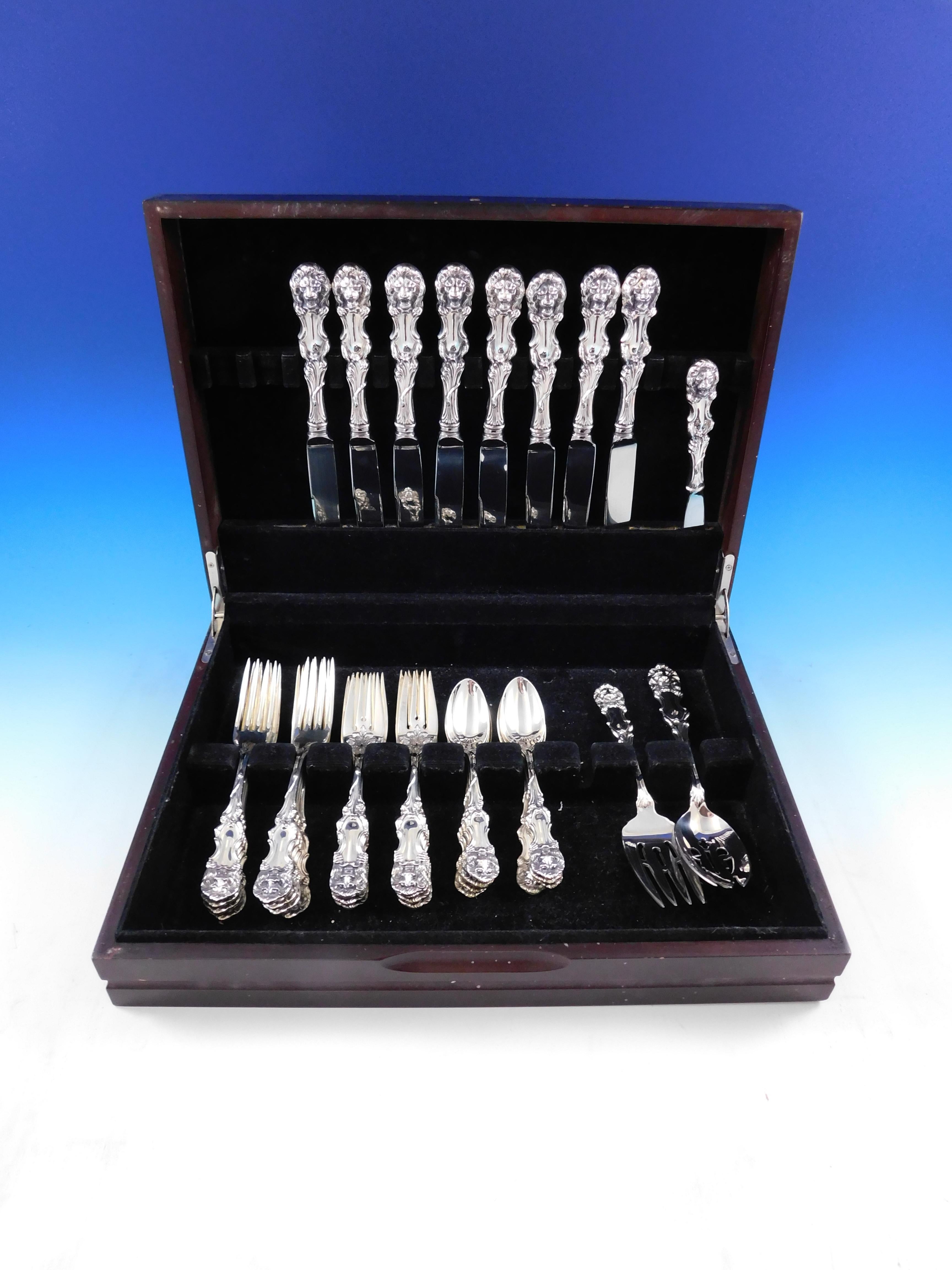 Scarce Lion by Frank Smith sterling silver flatware set, 35 pieces. This fabulous figural pattern features a lions head handle with flowing mane on both sides as well as legs and paws down the handle, surrounding a central shield shaped cartouche.