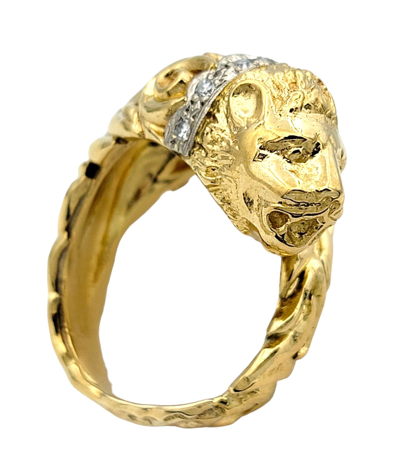 Ring Size: 6.75

Exuding regal charm and bold elegance, this lion motif bypass ring is a striking piece of jewelry crafted in luxurious 14 karat gold. At its forefront is a majestic lion head, intricately detailed and crafted with exquisite