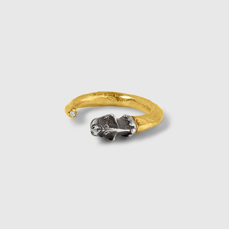 Lion Carved Ring with Diamond, by Prehistoric Works of Istanbul, Turkey, handmade in Turkey
Ring Details: Size 6,
slightly adjustable,
Gold - 1.65 grams,
Sterling silver - 3.40 grams,
Diamond - 0.01 ct