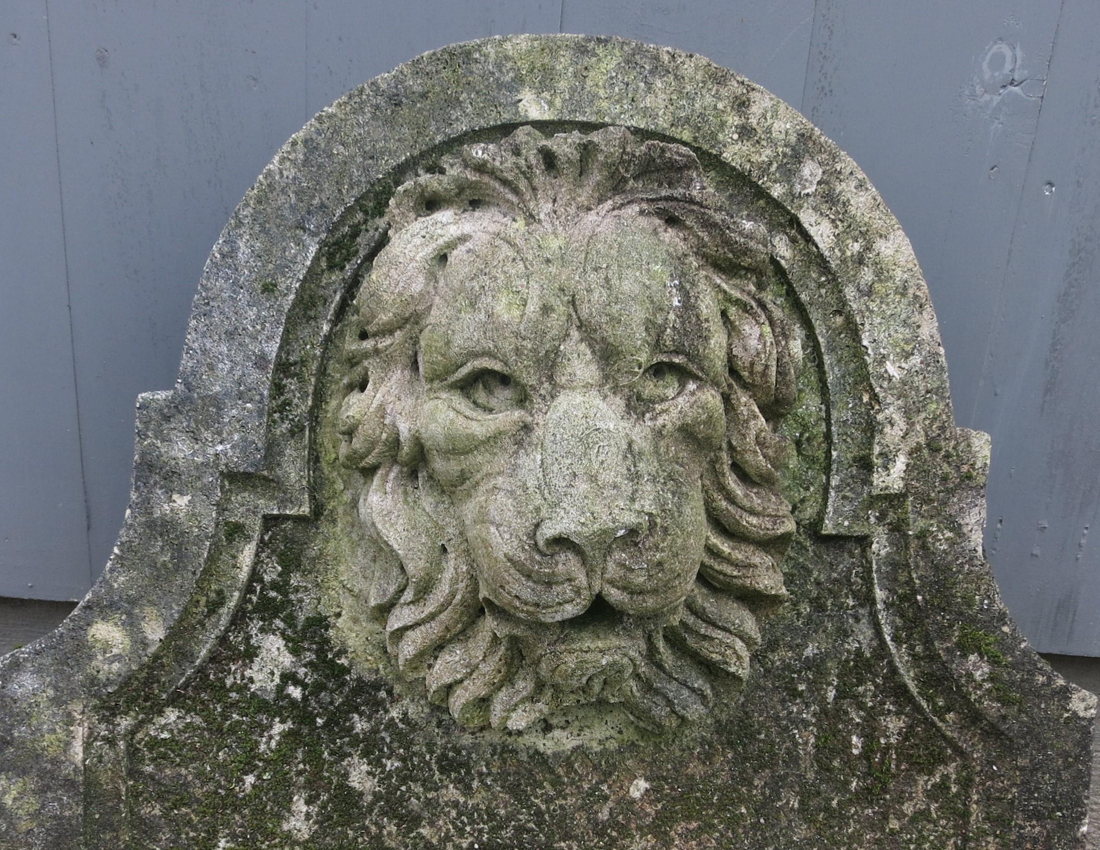 Lion head cast stone fountain back. Nice age and patina. It is 21.75