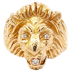 Bague tête de lion en or jaune 14 carats et diamants