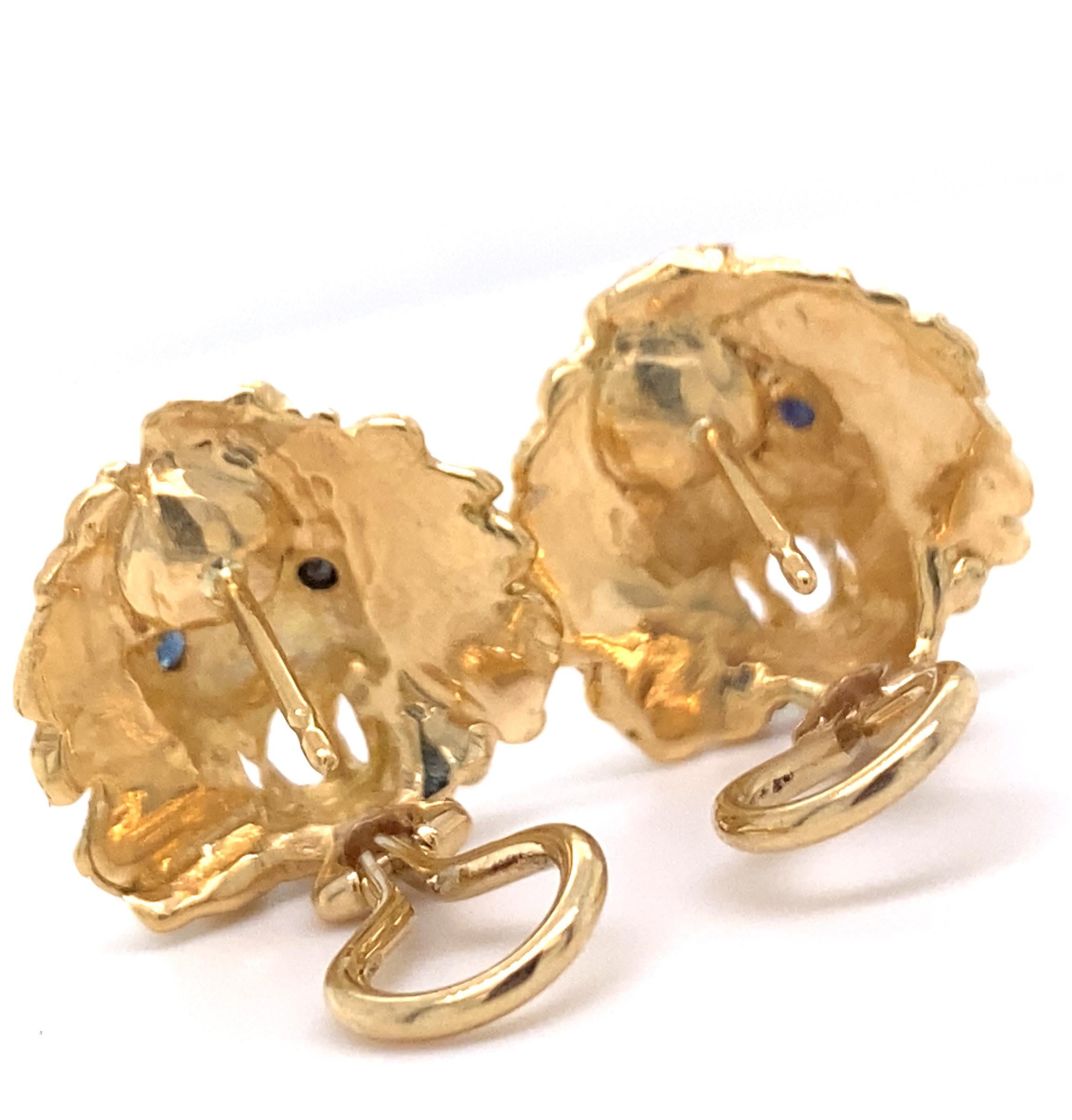 Lion Head Stud Earrings with Sapphire Eyes & Hinged Omega Posts in Yellow Gold For Sale 2