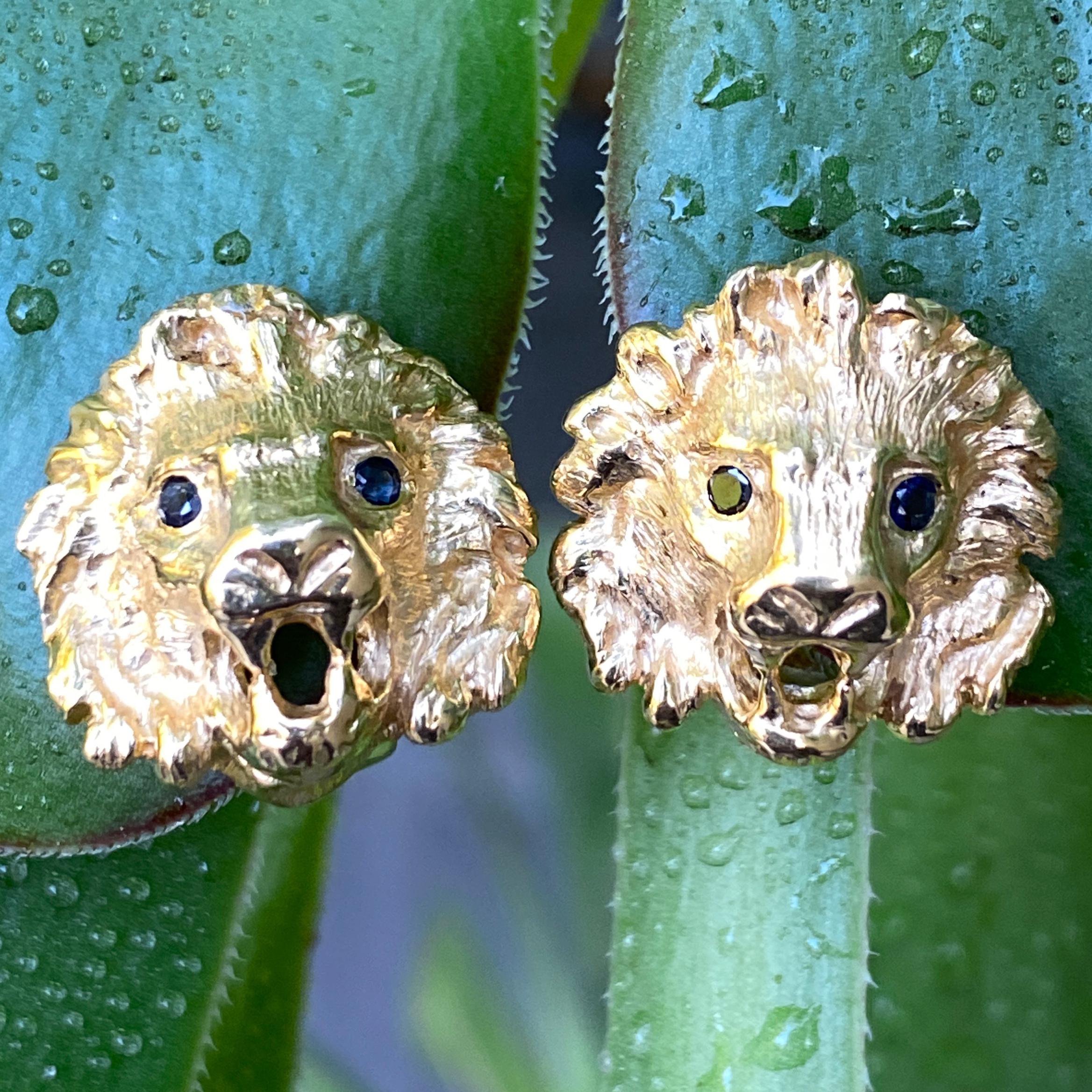 Contemporary Lion Head Stud Earrings with Sapphire Eyes & Hinged Omega Posts in Yellow Gold For Sale