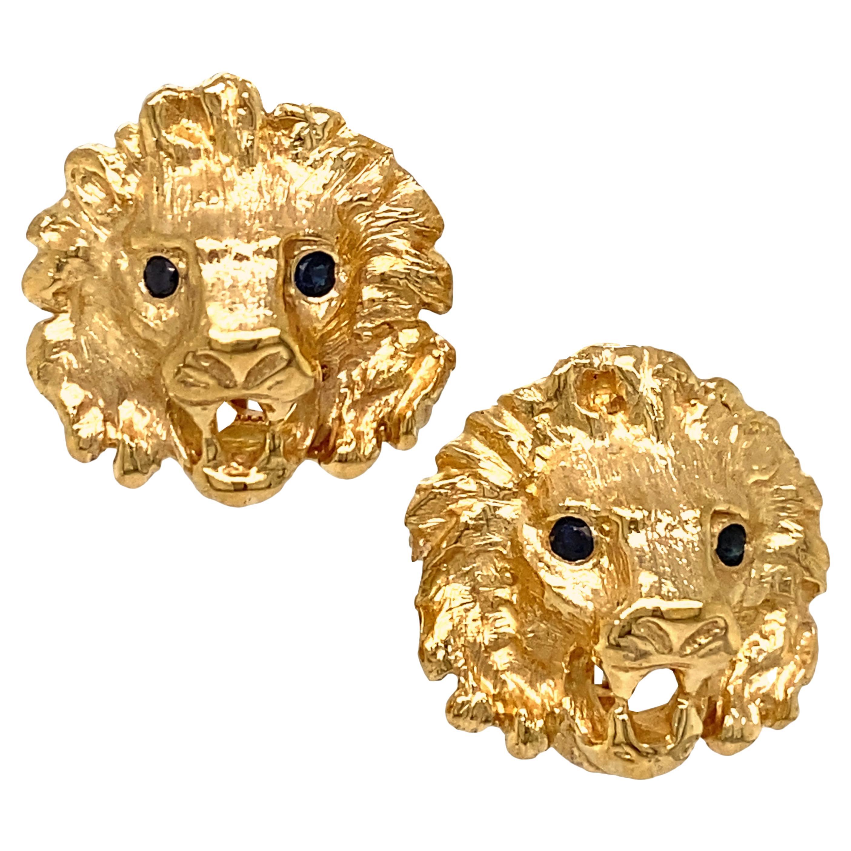 Lion Head Stud Earrings with Sapphire Eyes & Hinged Omega Posts in Yellow Gold For Sale