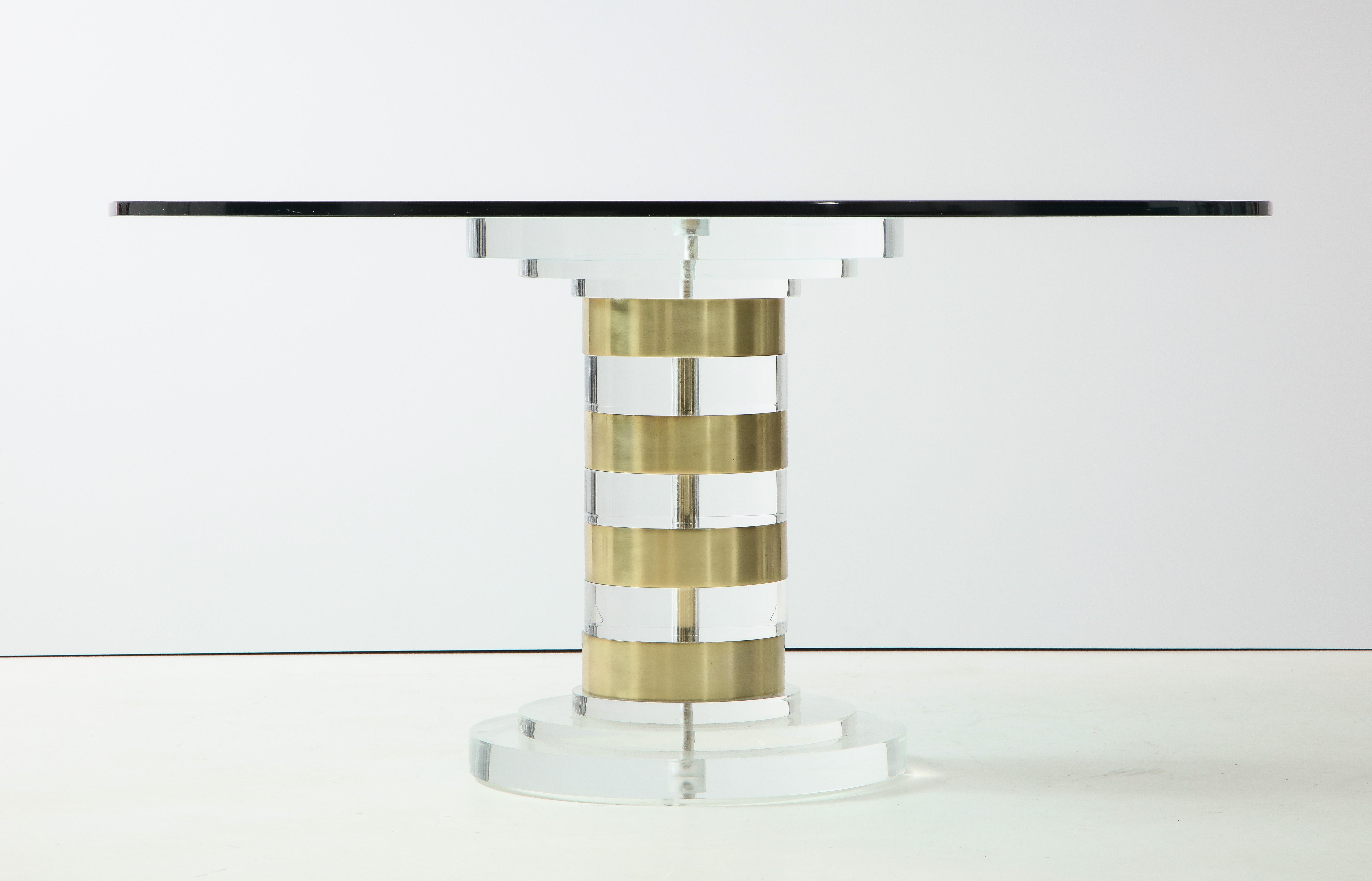 Beautiful lucite and brass dining table / side table by Lion in Frost.
The table can be used as a dining table or a side table and comes with a 60