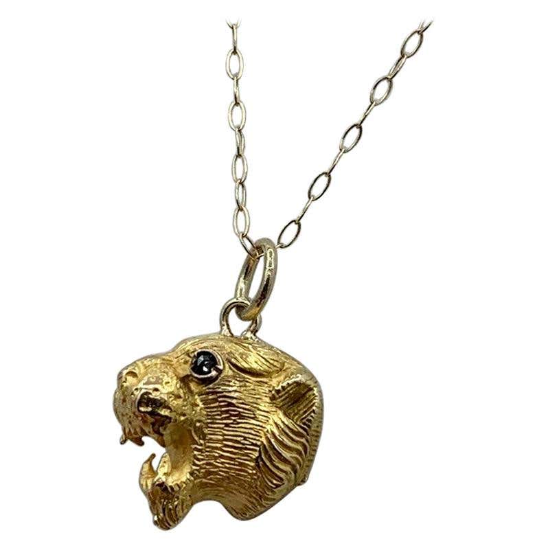 Gold lion pendant with ruby eyes Clearance