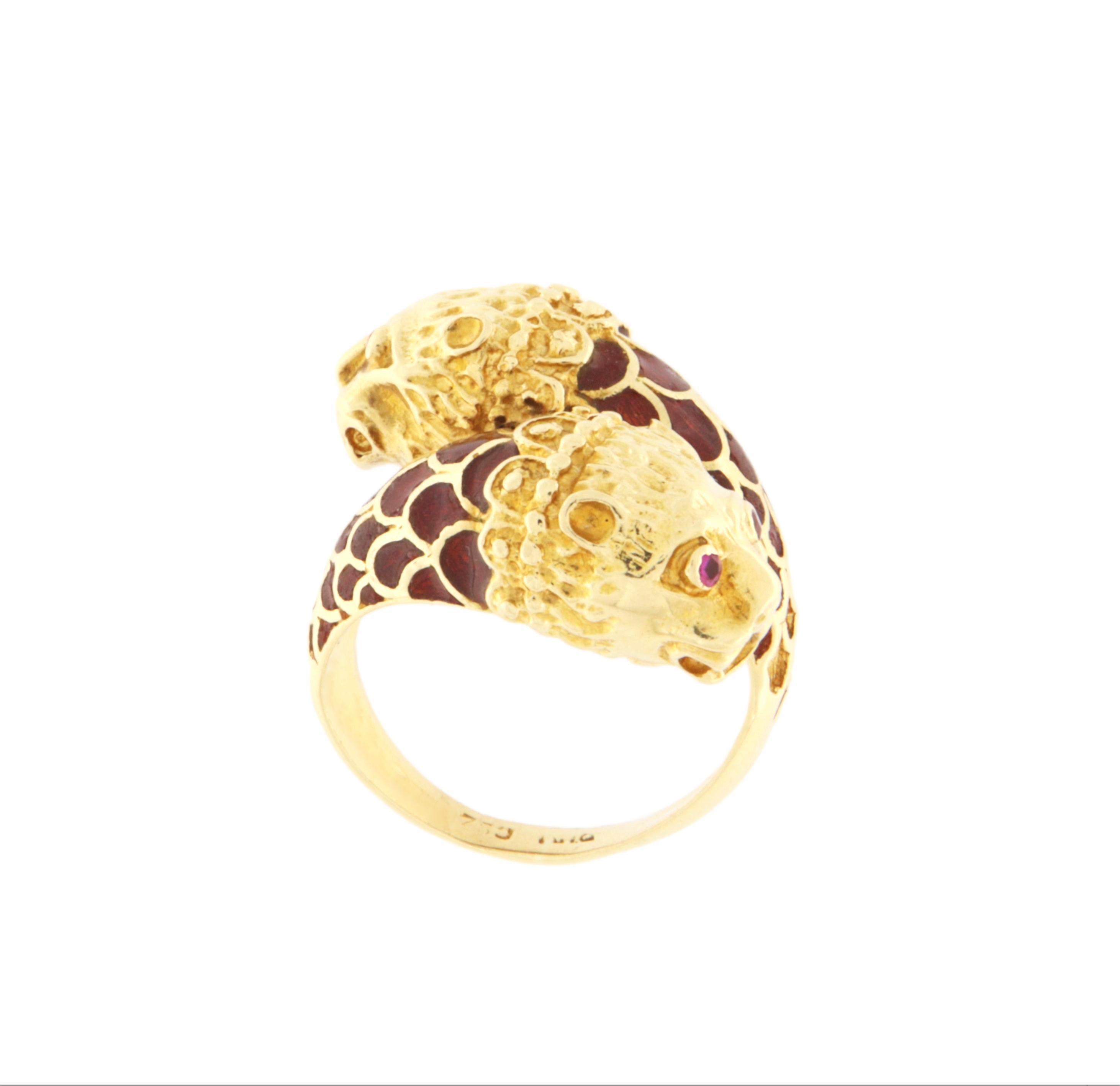 Magnificent 18-karat yellow gold ring that instantly commands attention with its bold design and rich symbolism. This entirely handcrafted piece features two lion heads facing each other, symbolizing strength, protection, and royalty. A sculptural,