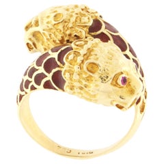 Anillo de cóctel de oro amarillo de 18 quilates con rubíes león