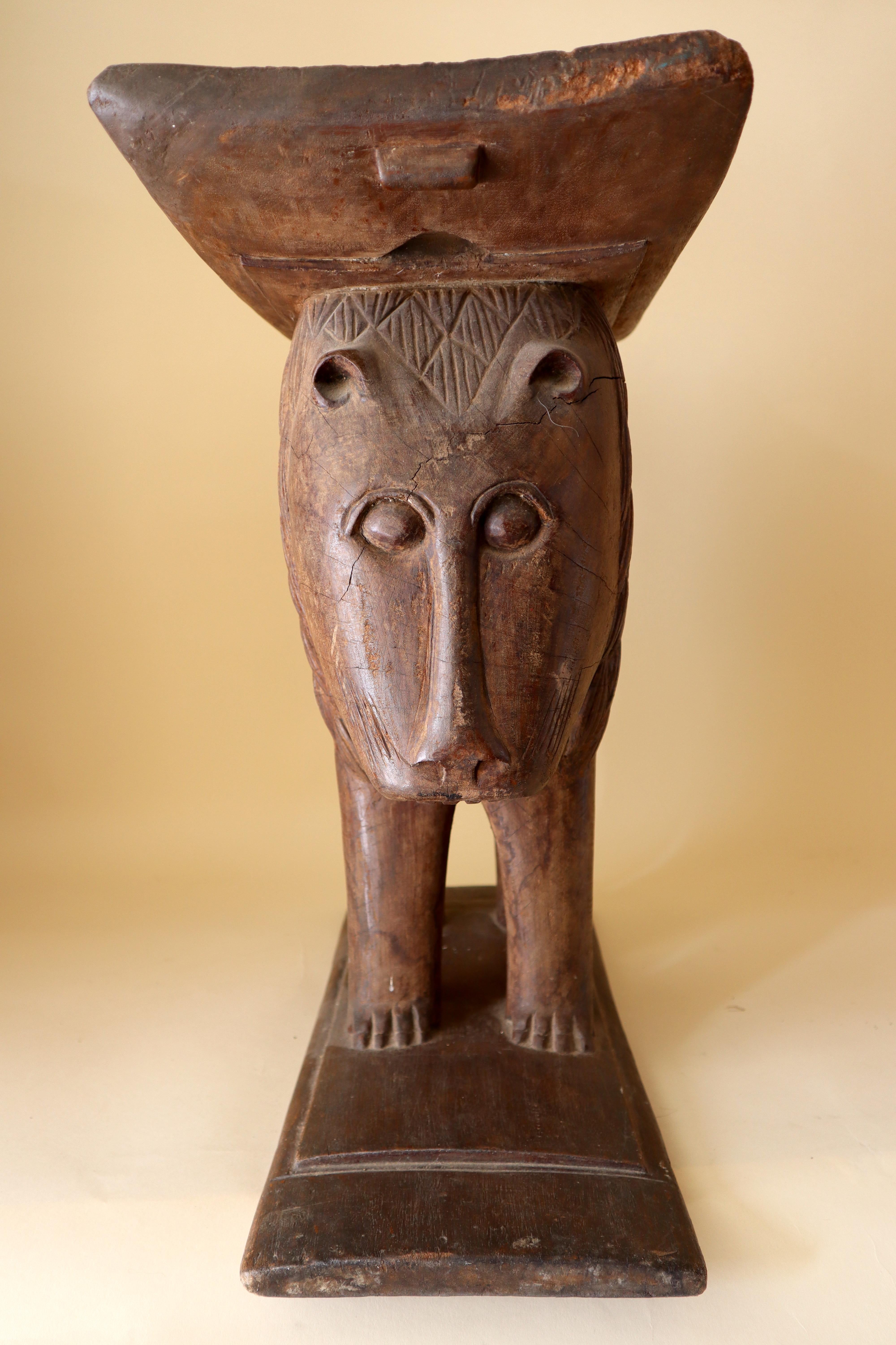 A stately seat or stool for a royal person of the Akan people, Ghana. The Ashanti and Fante People are the primary subgroups of the Akan in Ghana. Created in the early to middle part of the 20th century. Wood with some patina from use.
Stools or