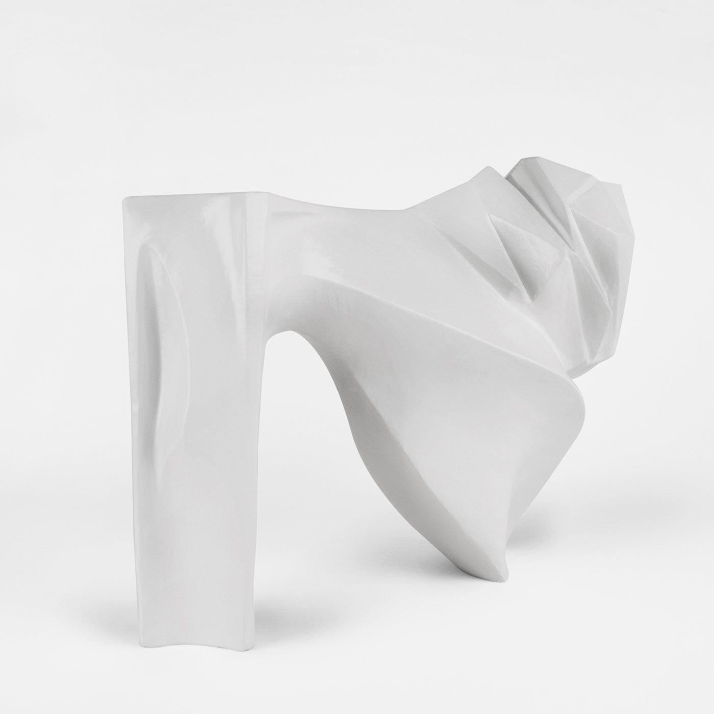 Artistic sculpture in grès in elegant and minimalist design, finished entirely by hand and produced in limited numbers. The model is made using a plaster mold and then individually remodelled by hand. The ceramic coating is a unique white satin