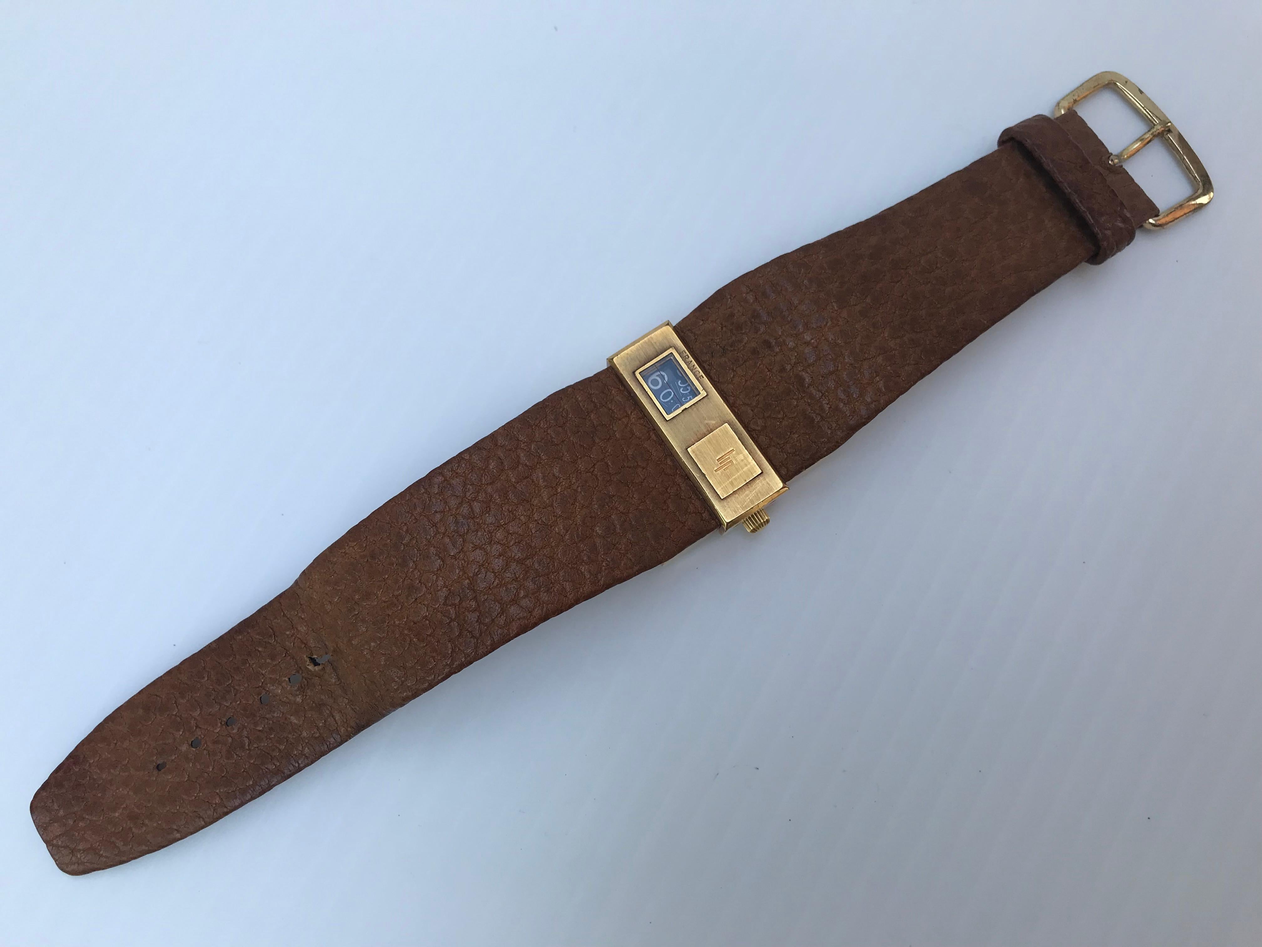 Lip Baschmakof automatic men's watch bracelet goldplated with original leather bracelet. Some wear, visible on the leather bracelet, Made in France 2nd half of the 20th century, in working order.