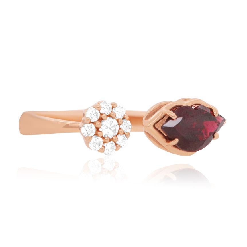 14K Rose Gold
1 Lip Shaped Garnet at 1.75 Carats - 10.2 x 5.6 millimeters 
9 Brilliant Round White Diamonds at 0.25 Carats
Color: H-I
Clarity: SI

Alberto offers complimentary sizing on all rings.

Fine one-of-a-kind craftsmanship meets incredible