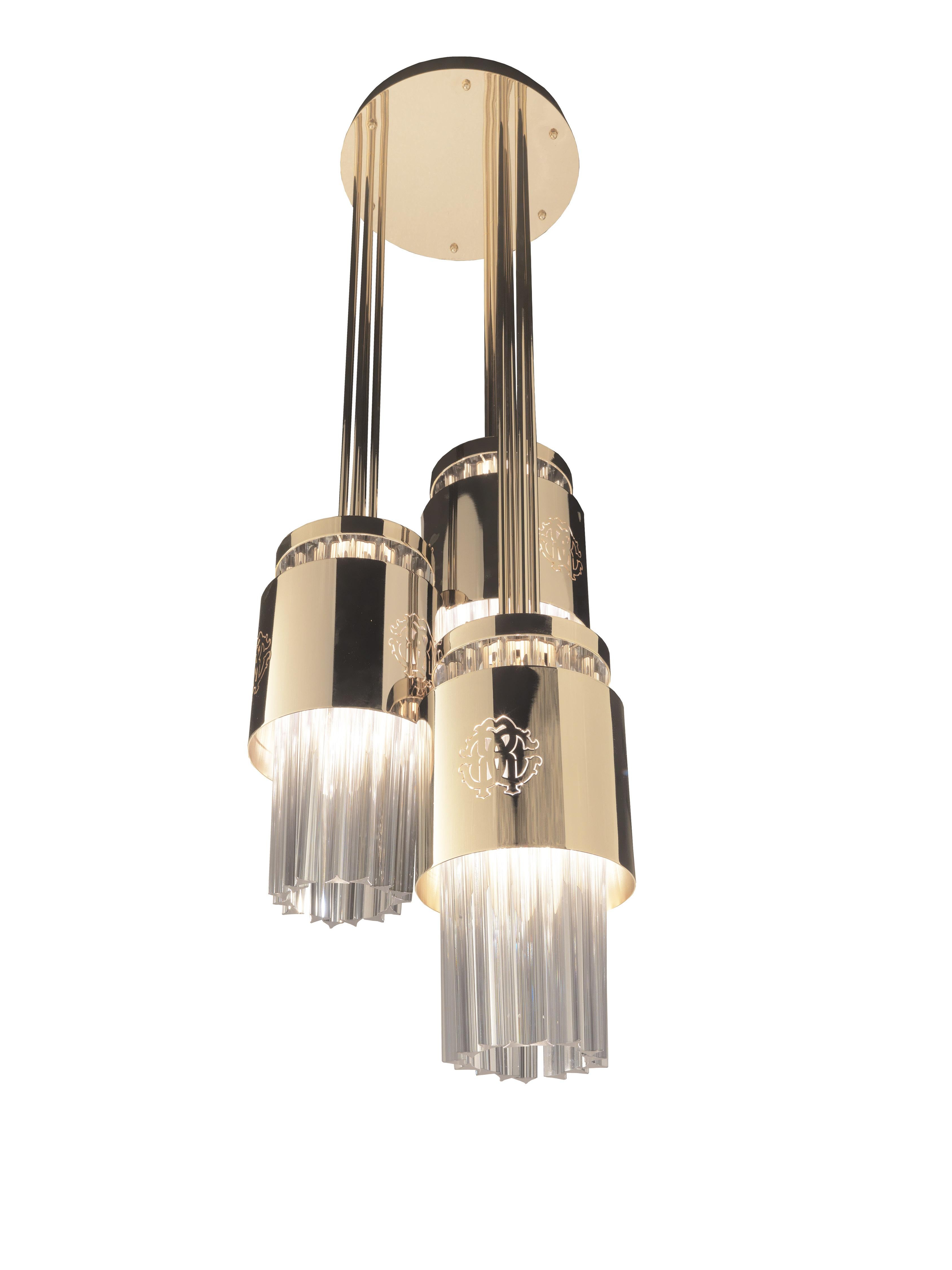 Chandelier with metal arms light gold finishing and glass sticks. Suitable dimension for ceiling height 300 cm.
 