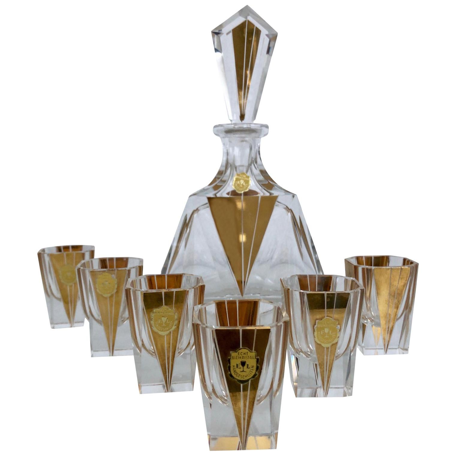 A Nice Antique Decanter Set or Tantalus at 1stDibs