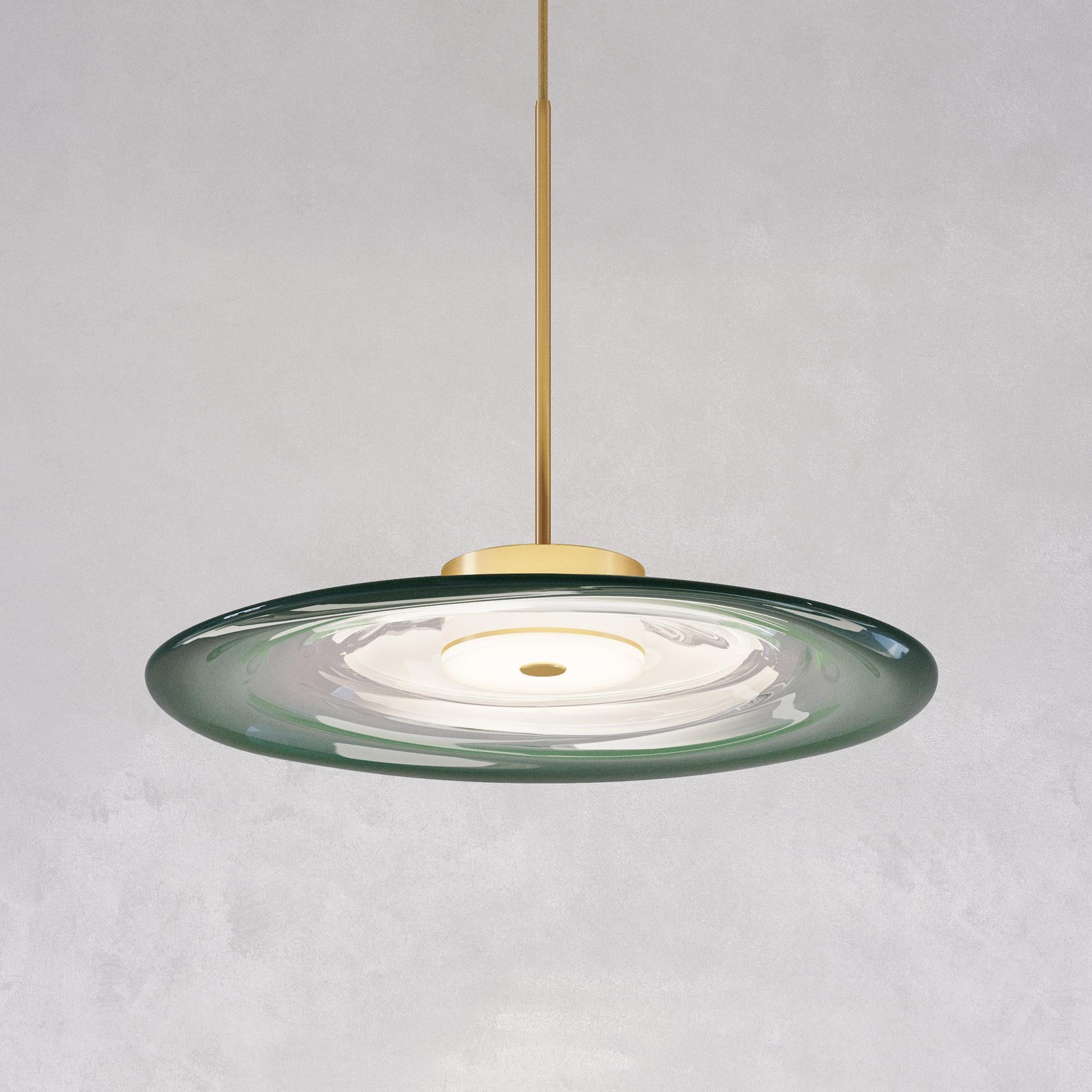 Liquid Pendant Jade by Atelier001
Dimensions: D50 x H38 cm
Materials: hand-blown glass, Brass.
Also available: In different finishes.

All our lamps can be wired according to each country. If sold to the USA it will be wired for the USA for