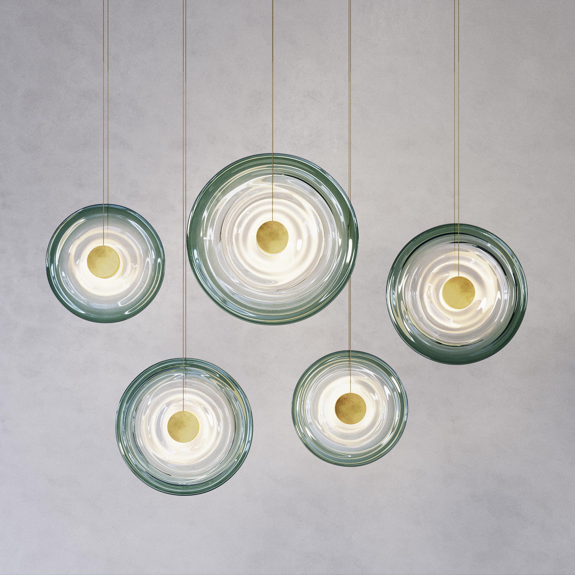 Liquid Vortex Quin Jade Pendant by Atelier001
Dimensions: D17.5 x W142.5 x H93.5 cm
Materials: Hand-blown glass, Brass.
Also Available: In different finishes.

All our lamps can be wired according to each country. If sold to the USA it will be wired