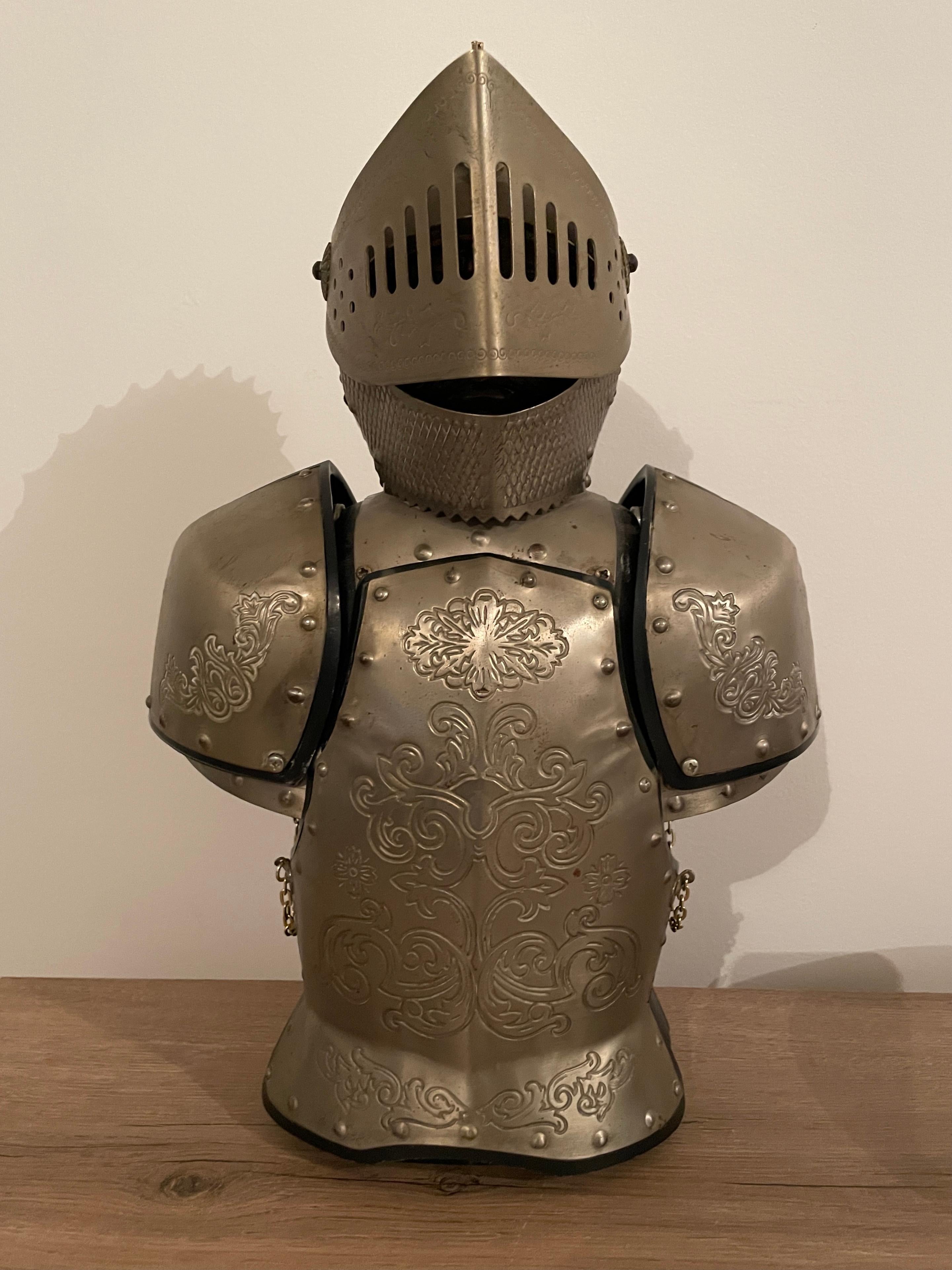 Liquor cabinet - hidden dry bar. In Medieval style. Knight's armor. 
Complete set:
6 glasses with a bottle in perfect condition. 1950s. France.