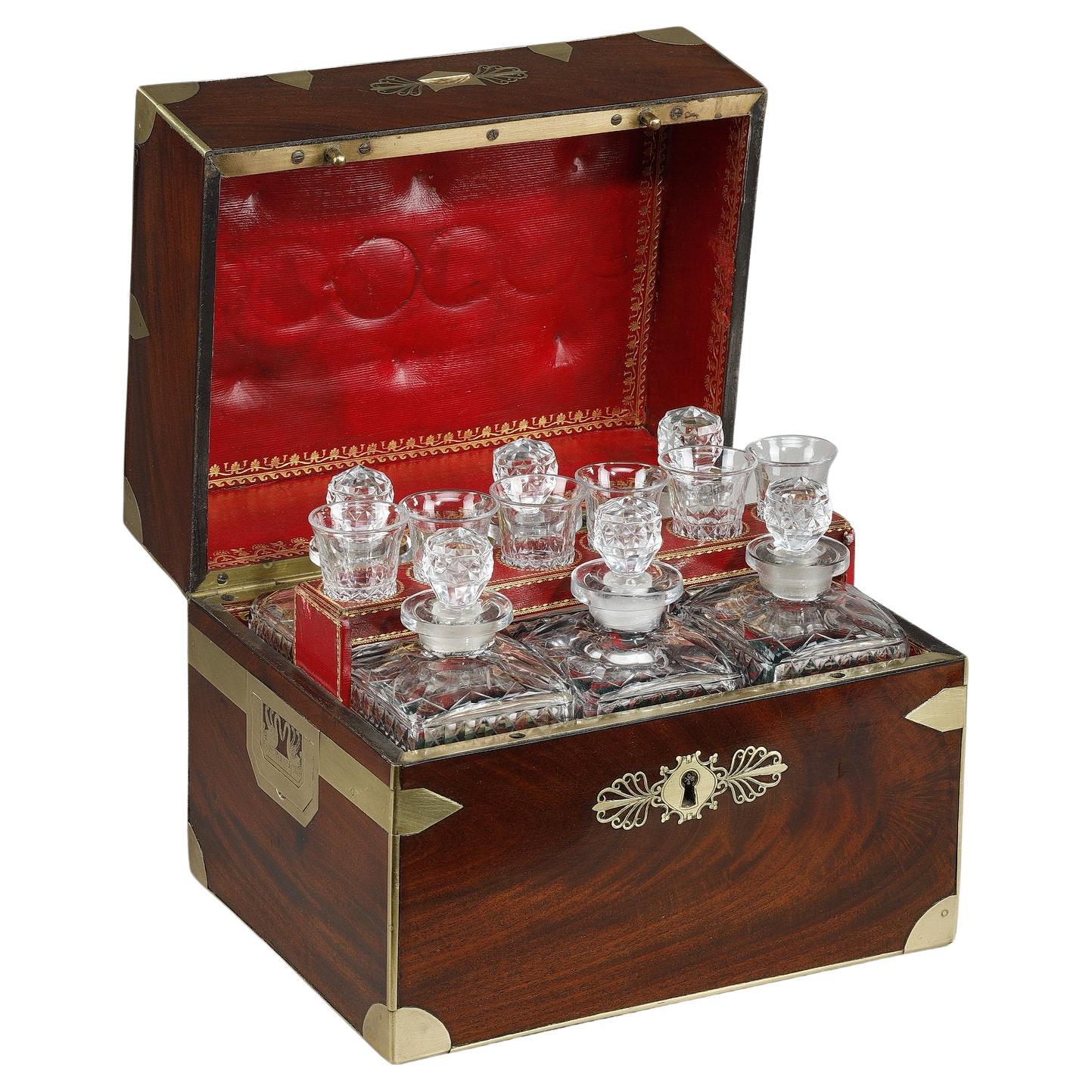 Liquor cellar with cut crystal bottles and glasses For Sale
