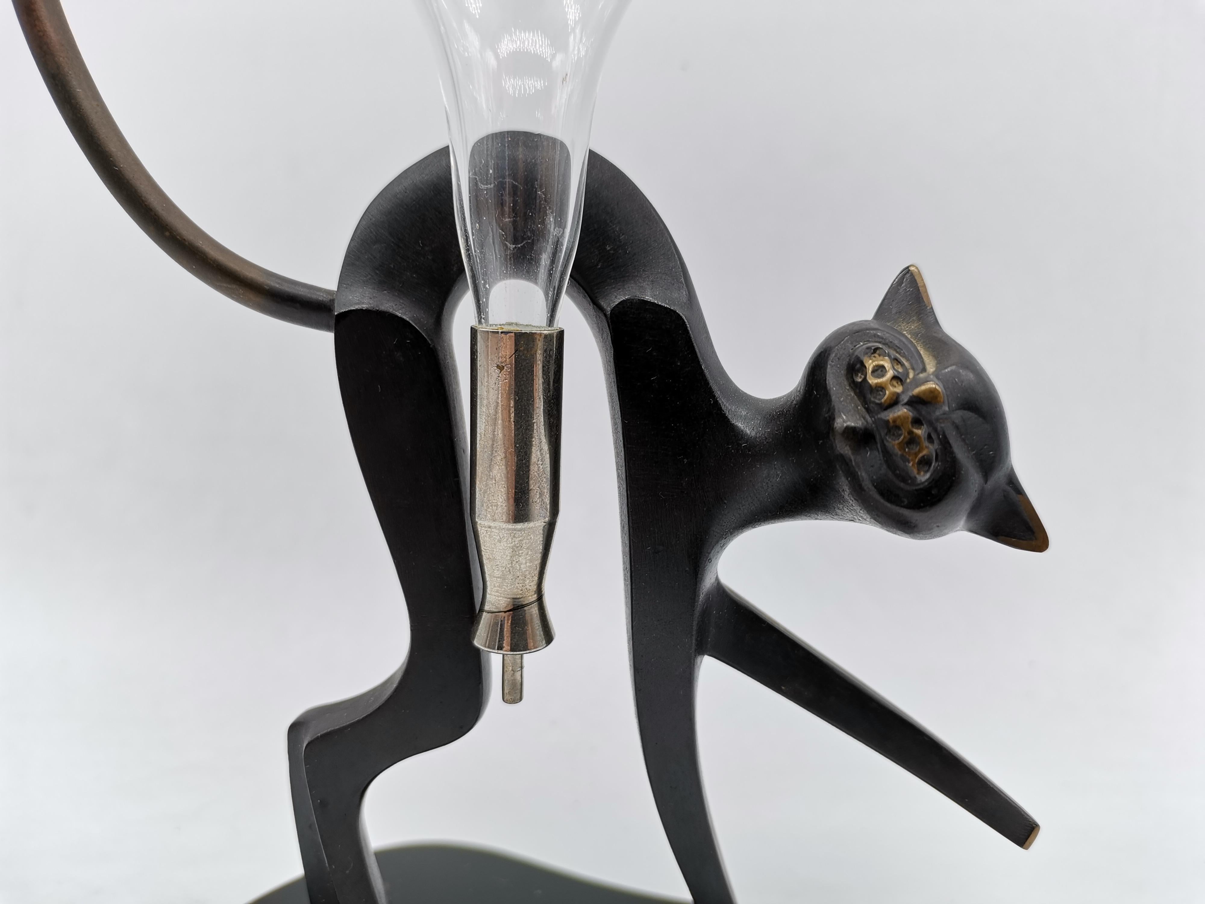 A holde for liqour or oils by Richard Rohac in cat shape.