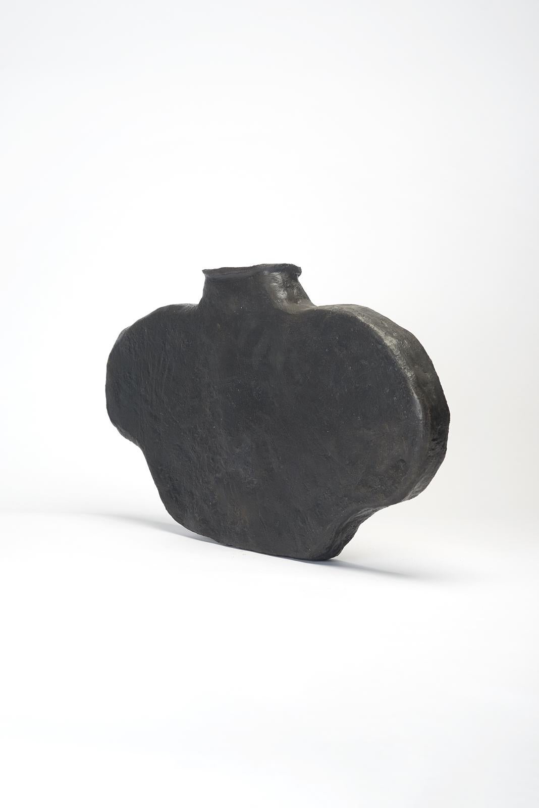 Lira vase by Willem Van hooff
Core Vessel series
Dimensions: W 42 x H 35 cm
Materials: Earthenware, ceramic, pigments, glaze

Core is a series of flat vessels inspired by Prehistoric African building techniques. Willem has been fascinated by