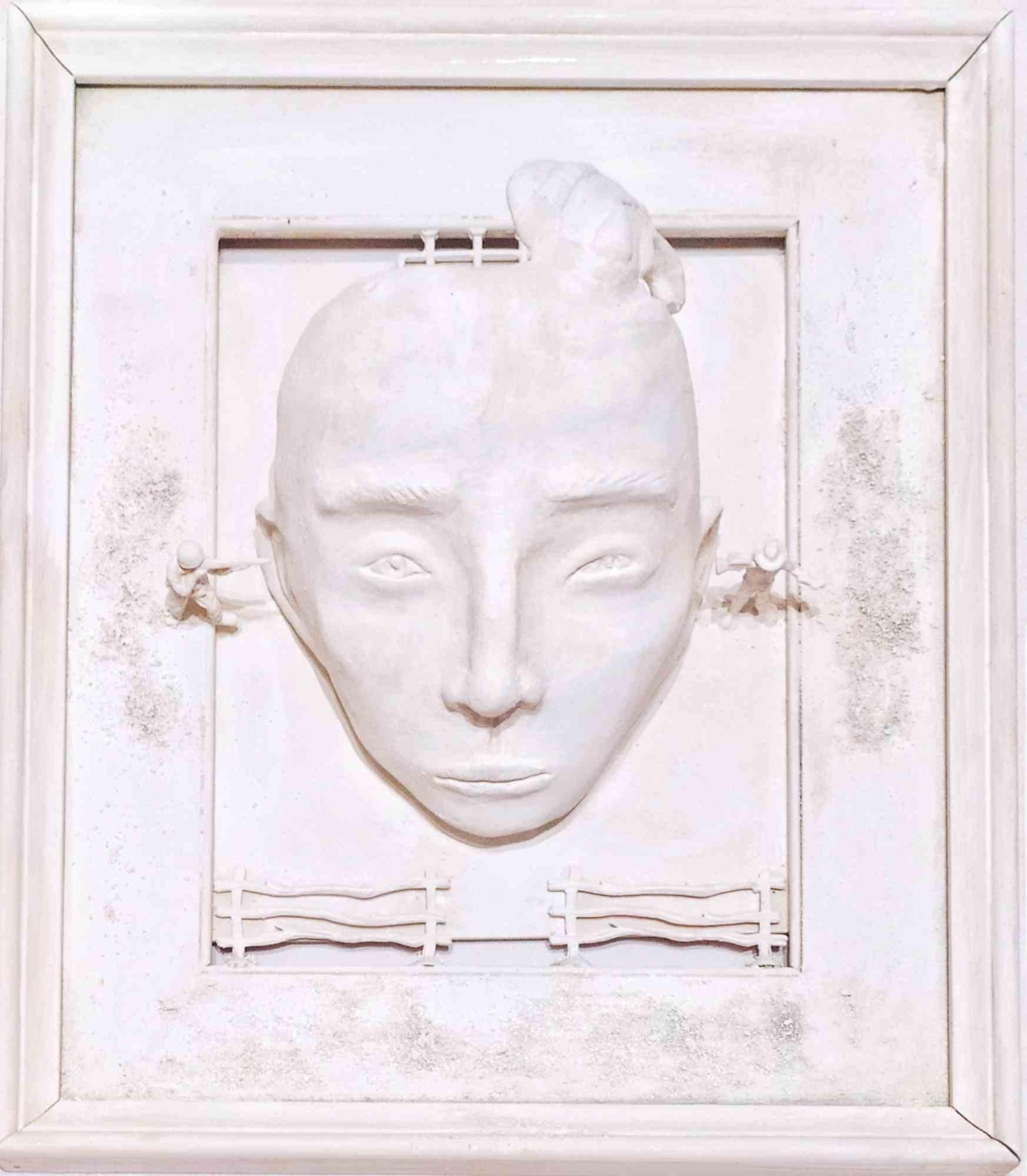 Mixed media realized by Lisartventure.

The work is modeled by hand in plaster paste assembled n a wooden frame. It was realized in 2023 in Turin.
