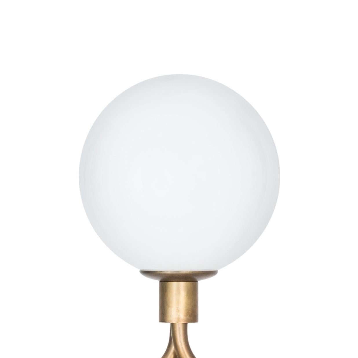 Table lamp model Eld Klot designed by Lisa Hilland and manufactured by Konsthantverk.

The production of lamps, wall lights and floor lamps are manufactured using craftsman’s techniques with the same materials and techniques as the first