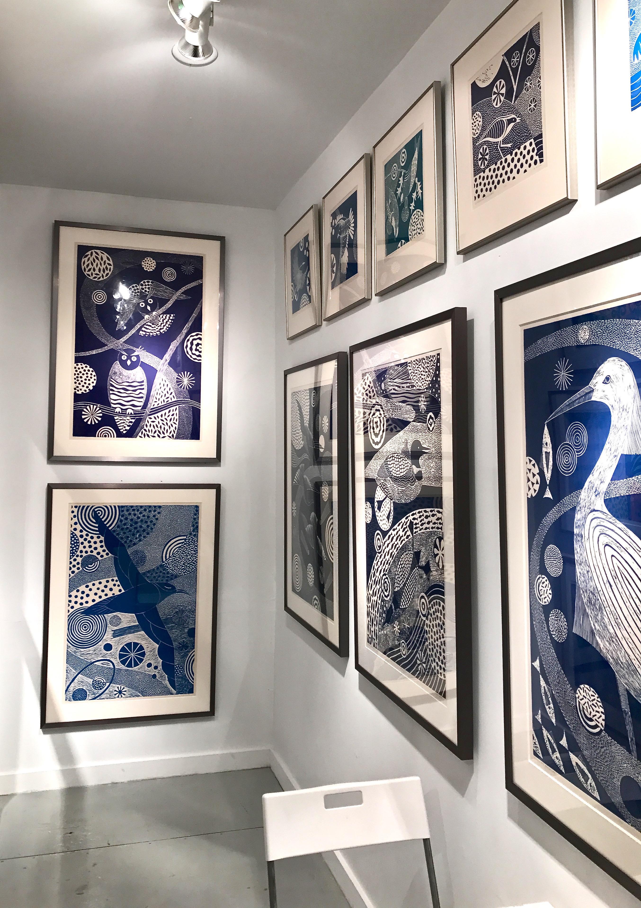 'Preening and Posing'  Linoleum Block Print, Edition 10,  35 1/4 x 23 1/4 Inches, is one of a series of 8 related prints in this size in varying shades of blue.   Sold individually or as sets of 2, 3, 4, 5, 6, 7 or 8. 

There is also a separate