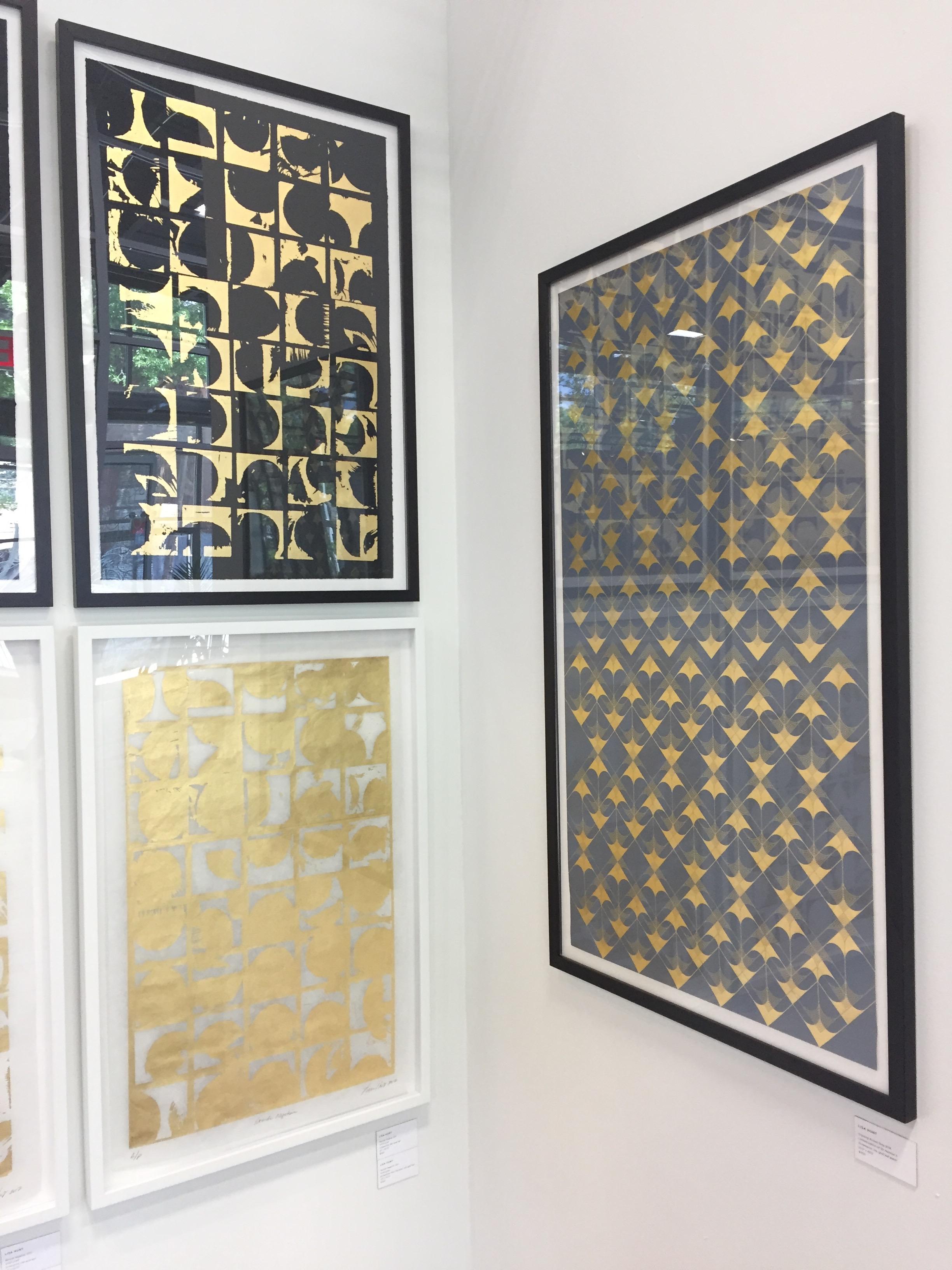 Lisa Hunt’s Crossing Arrows Grey is an abstract screen printed work on gold leaf paper with black and metallic gold ink. The overlapping open and ruled arrows are graphic and form a symmetrical repeat pattern. The print is trimmed with the image