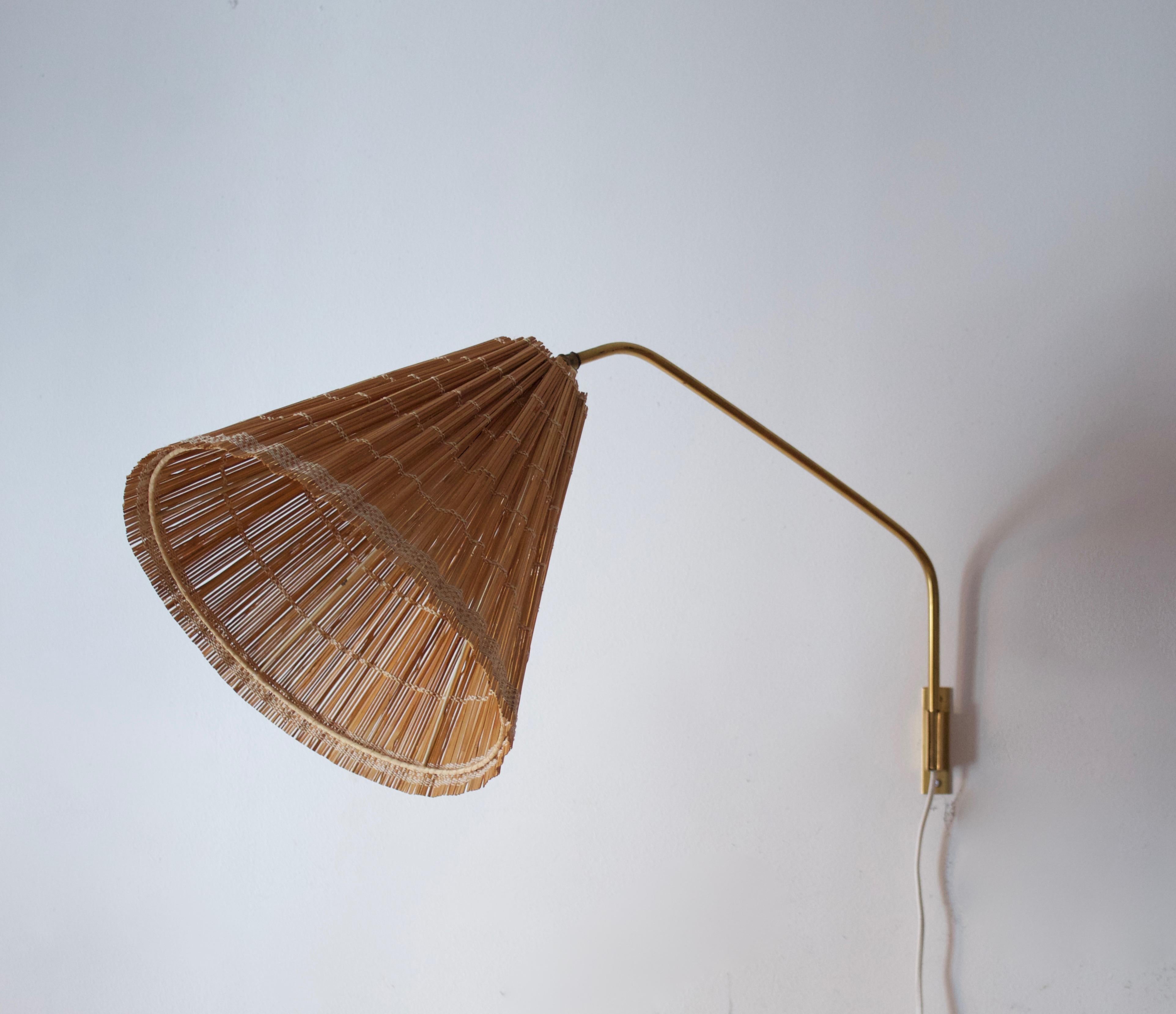An adjustable wall light designed by Lisa Johansson-Pape in 1950. Produced by Ornö, Kerava, Finland. Stamped with makers mark.

Other designers of the period include Paavo Tynell, Josef Frank, Ilmari Tapiovaara, and Alvar Aalto.