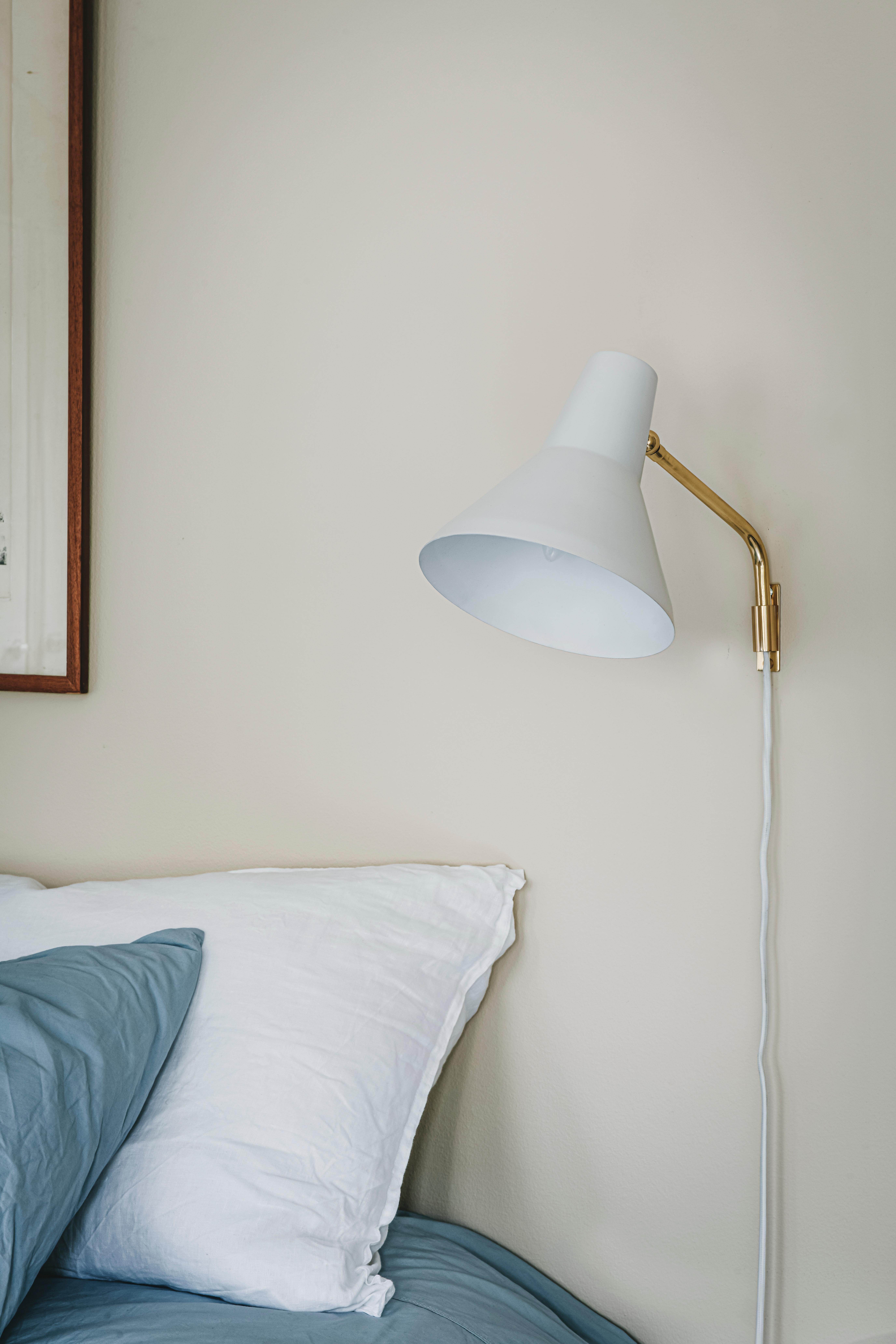 Lisa Johansson-Pape 'Carin' wall lamp in brass for Innolux. 

Innolux Carin is a new family of luminaires with a sophisticated look sealed by a brass or chrome arm. The beautiful metal dome is easy to direct and the practical touch switch brings a