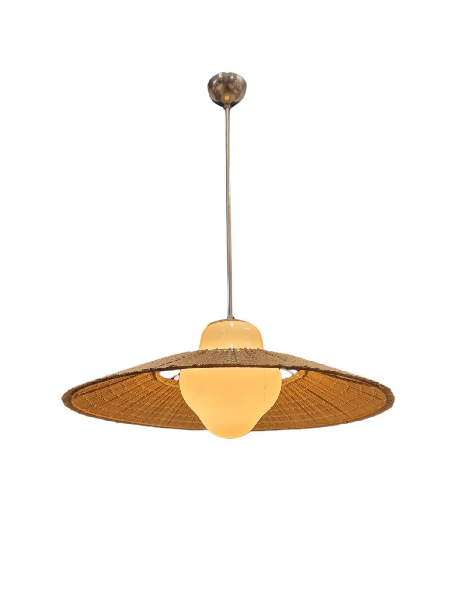 A beautiful Lisa Johansson-Papé ceiling lamp model 1088 by Orno. This lamp is one of the models that Lisa Johansson-Papé started working on when she arrived at Orno. The model was started by Gunilla Jung back in the 1930s and after her premature