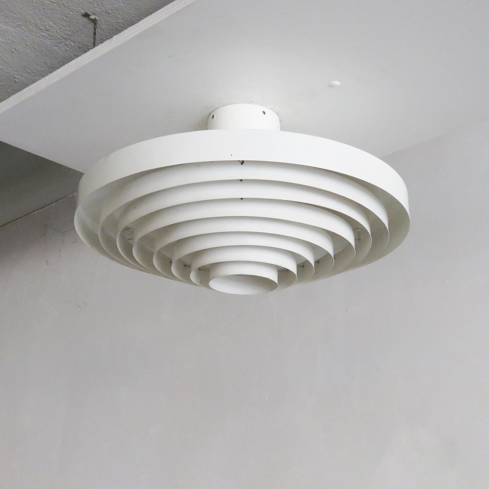 Wonderful ceiling flushmount lights by Lisa Johansson-Pape for Orno, Finland, 1960, in painted metal, with louvered reflector, wired for US standards, one E27 socket per fixture, max. wattage 75w, bulb provided as a onetime courtesy. Priced