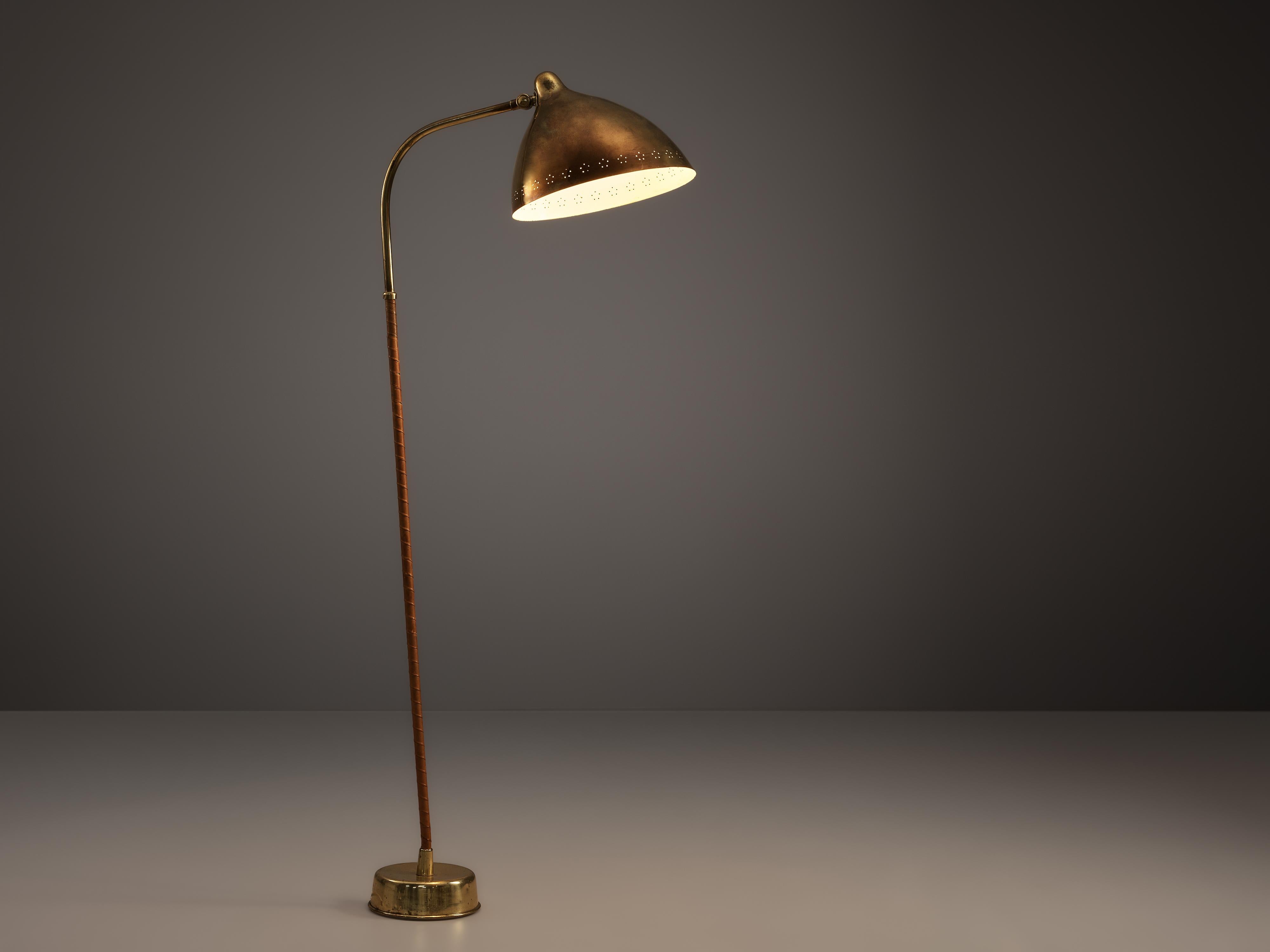 Lisa Johansson-Pape for Orno, floor lamp, brass, leather, Finland, 1950s

Stunning floor lamp by Finish designer Lisa Johansson-Pape. Lisa Johansson-Pape designed this lamp for Orno in the 1950s. The thin brass stem rests on a small round base.