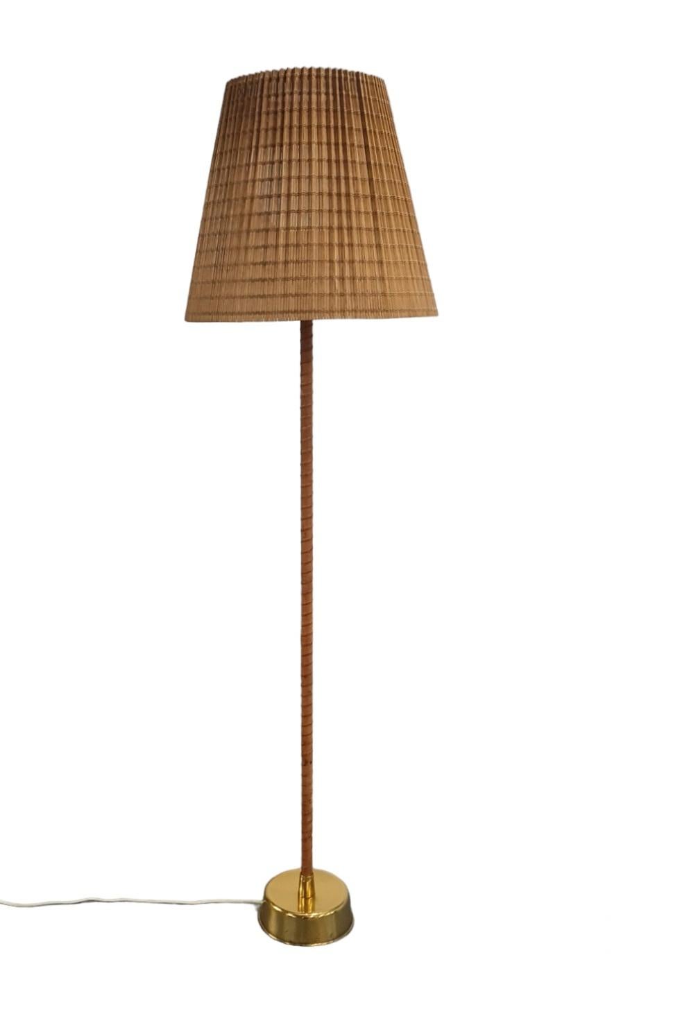 This `Ihanne' lamp became very popular in Finland with many different variations of stems, materials and shades. It was used in public buildings as well as private homes. The long reigning president Urho Kekkonen had the table version of this lamp