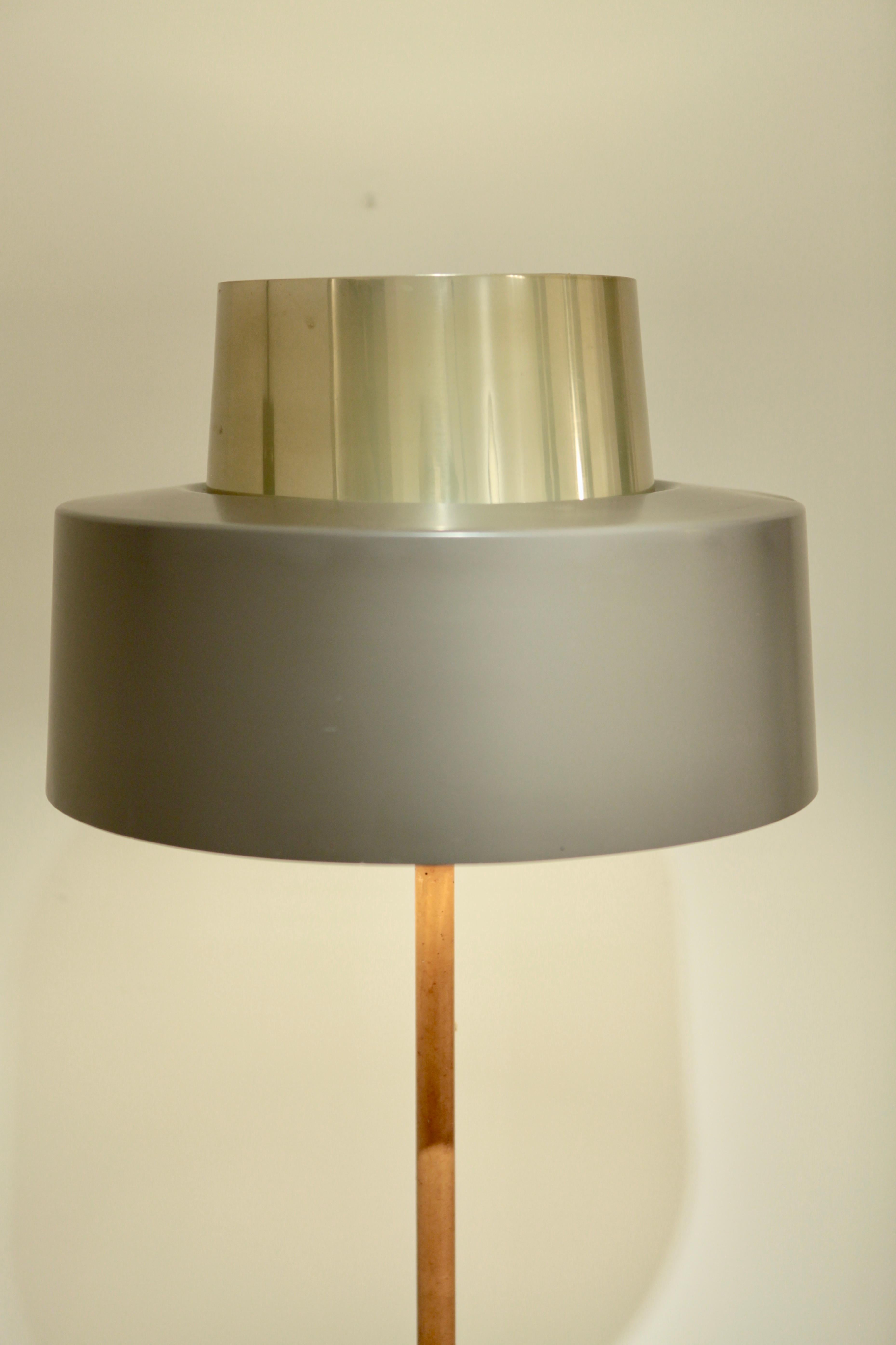 Lisa Johansson-Pape floor lamp by Orno in Finland 1960s.
Rare version with cognac leather covered pole and bronzed and brown painted metal with brass details.
Manufacturer's mark.
 
