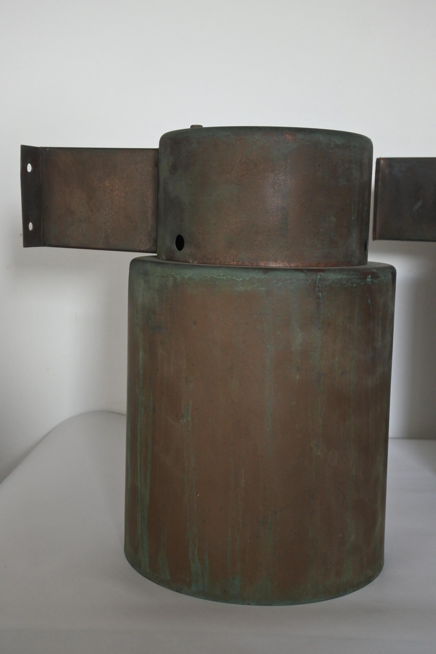 Pair of industrial style wall lamps by Lisa Johansson Pape. 
Manufactured by Orno Oy in Finland. 
Made of copper. 

Both marked Orno. 
For outdoor or indoor use. 
Outstanding patina.  

Documented in the Orno catalogues of the period.  
Even though