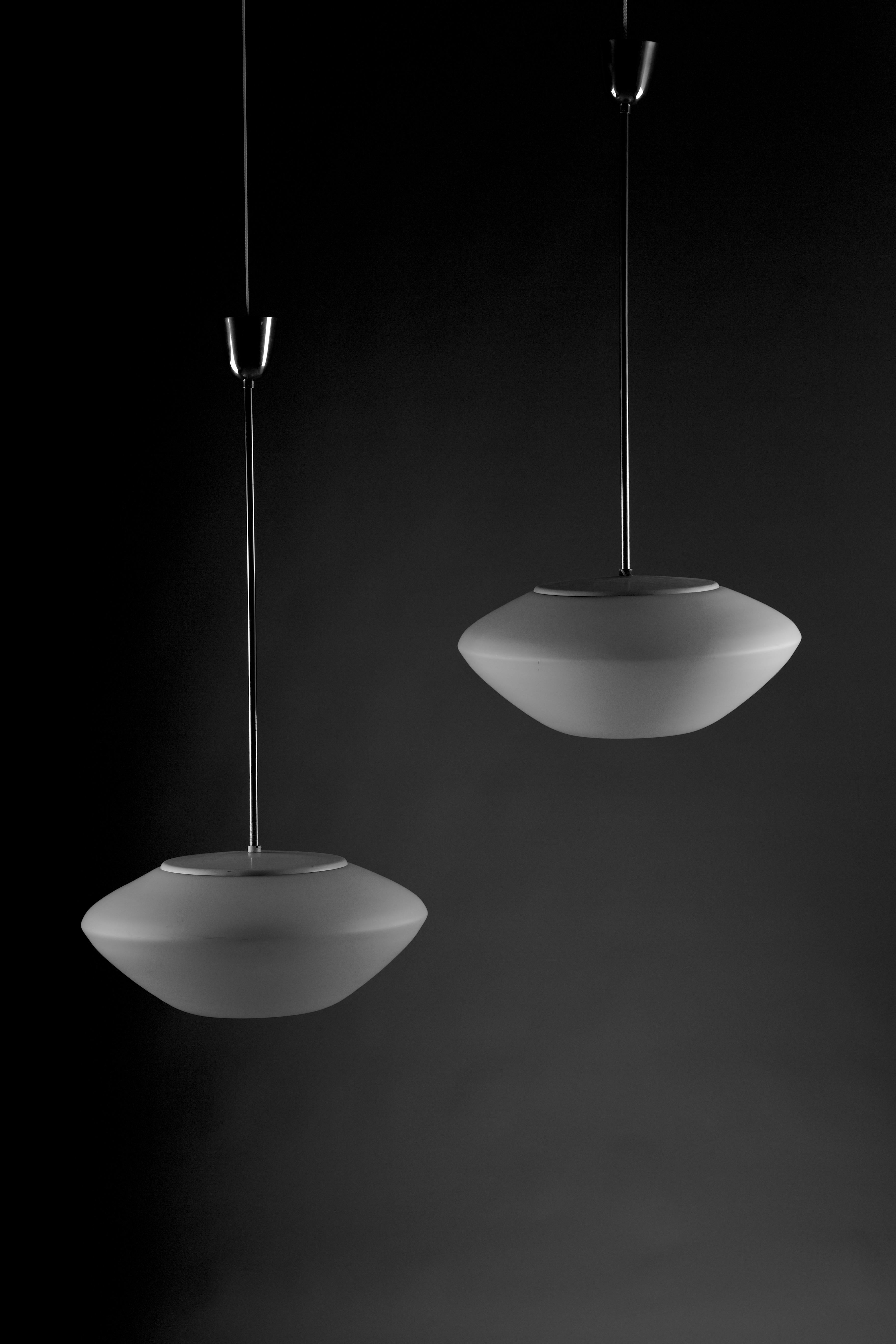 Mid-Century Modern Lisa Johansson-Pape, pair of mid-century modern ceiling lamps for ORNO For Sale