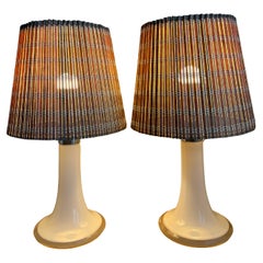 Lisa Johansson-Pape Coppia di lampade da tavolo modello 46-017, vetro e rattan, Orno 1960