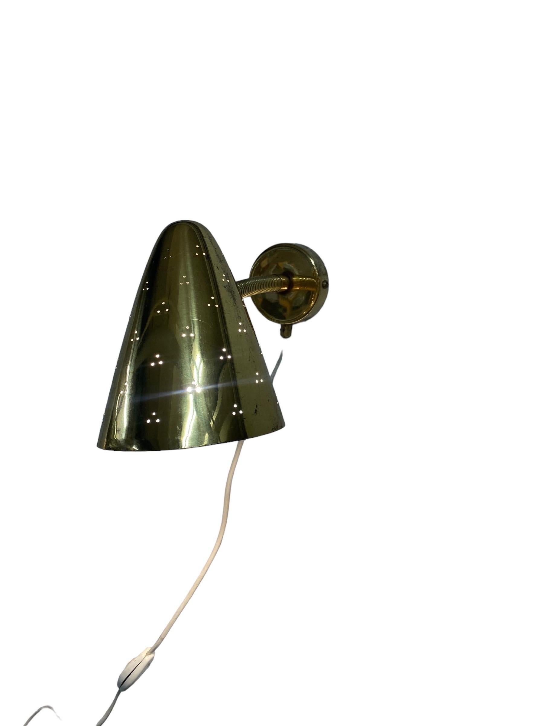 Mid-20th Century Lisa Johansson-Pape Perforated Brass Wall Sconce Model 50-084, Orno 1950s For Sale
