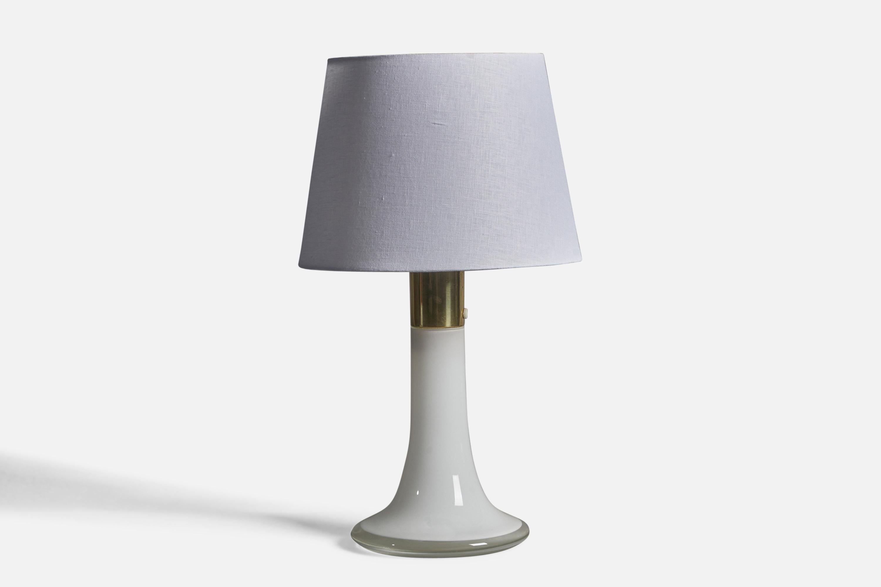 A chome metal and opaline glass table lamp, designed by Lisa Johansson-Pape and produced by Ornö, OY, Finland, 1960s.

Dimensions of Lamp (inches): 14.5
