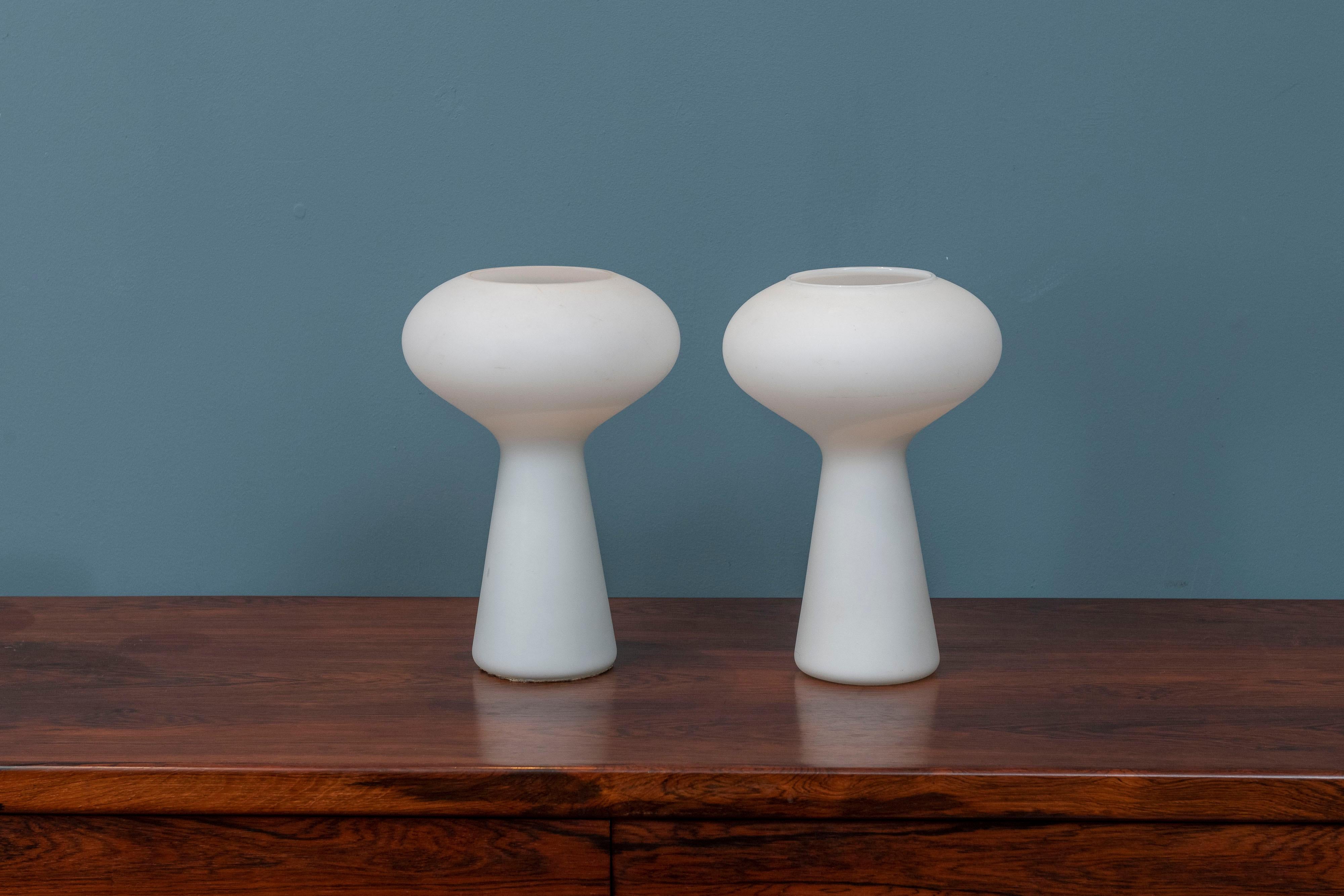 Lisa Johansson-Pape design pair of hand blown frosted glass table lamps. Assembled set one has a slightly more prominent lip at the top of lamp but the same otherwise.